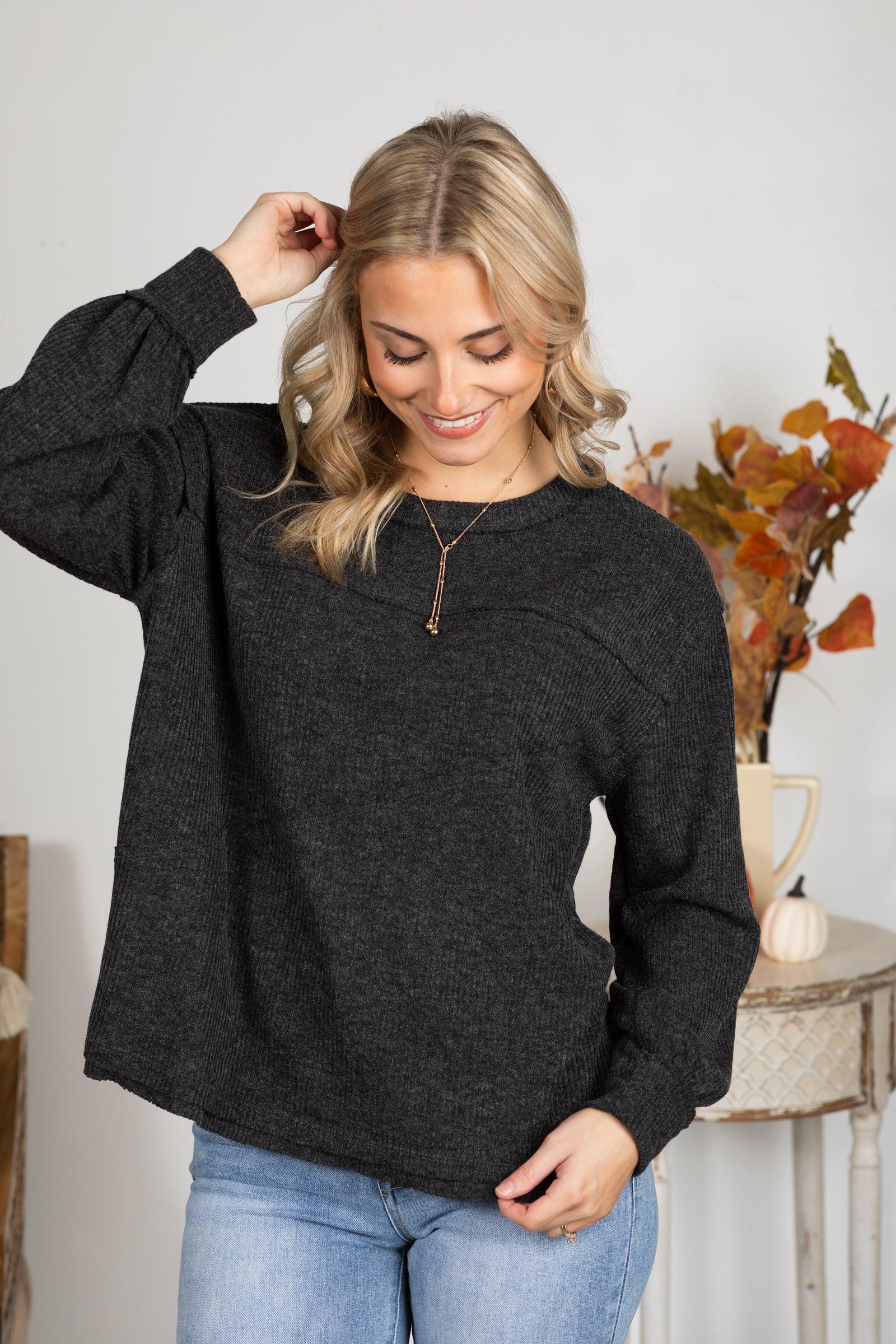Solid Knit Top With Asymmetrical Exposed Seams Product Image