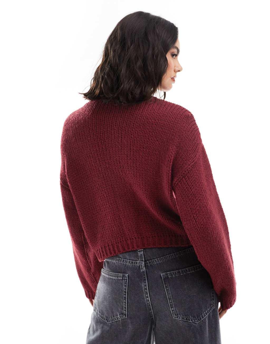 ASOS DESIGN loose knit crew neck cardigan in burgundy Product Image