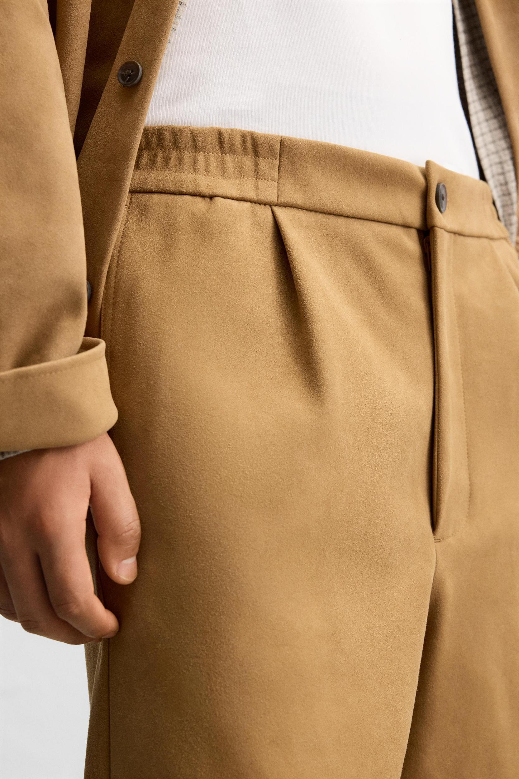 PLEATED FAUX SUEDE SHORTS Product Image