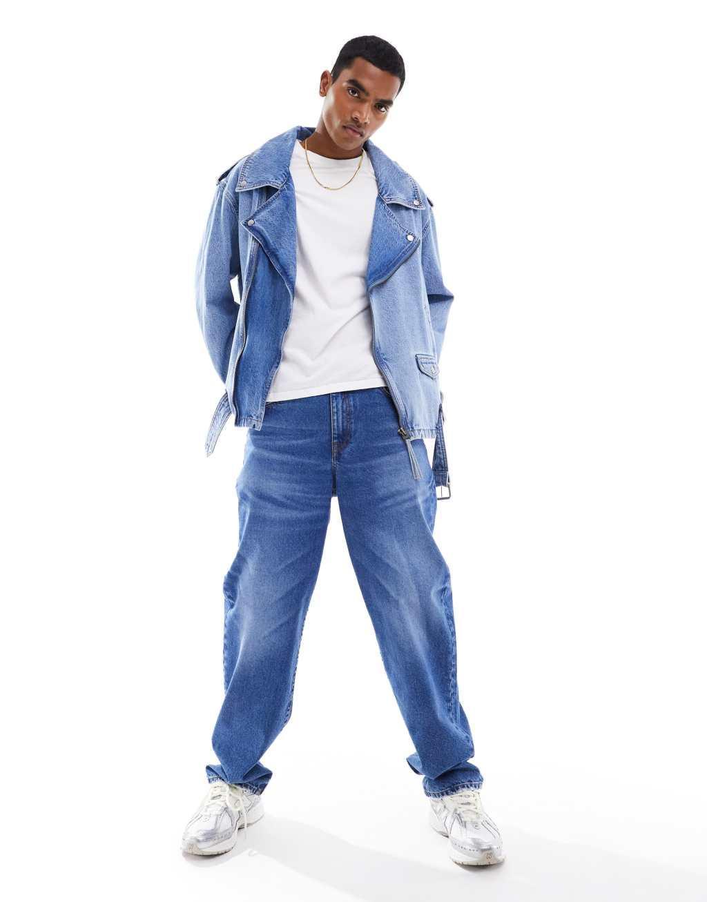 ASOS DESIGN oversized moto jacket in mid wash blue Product Image