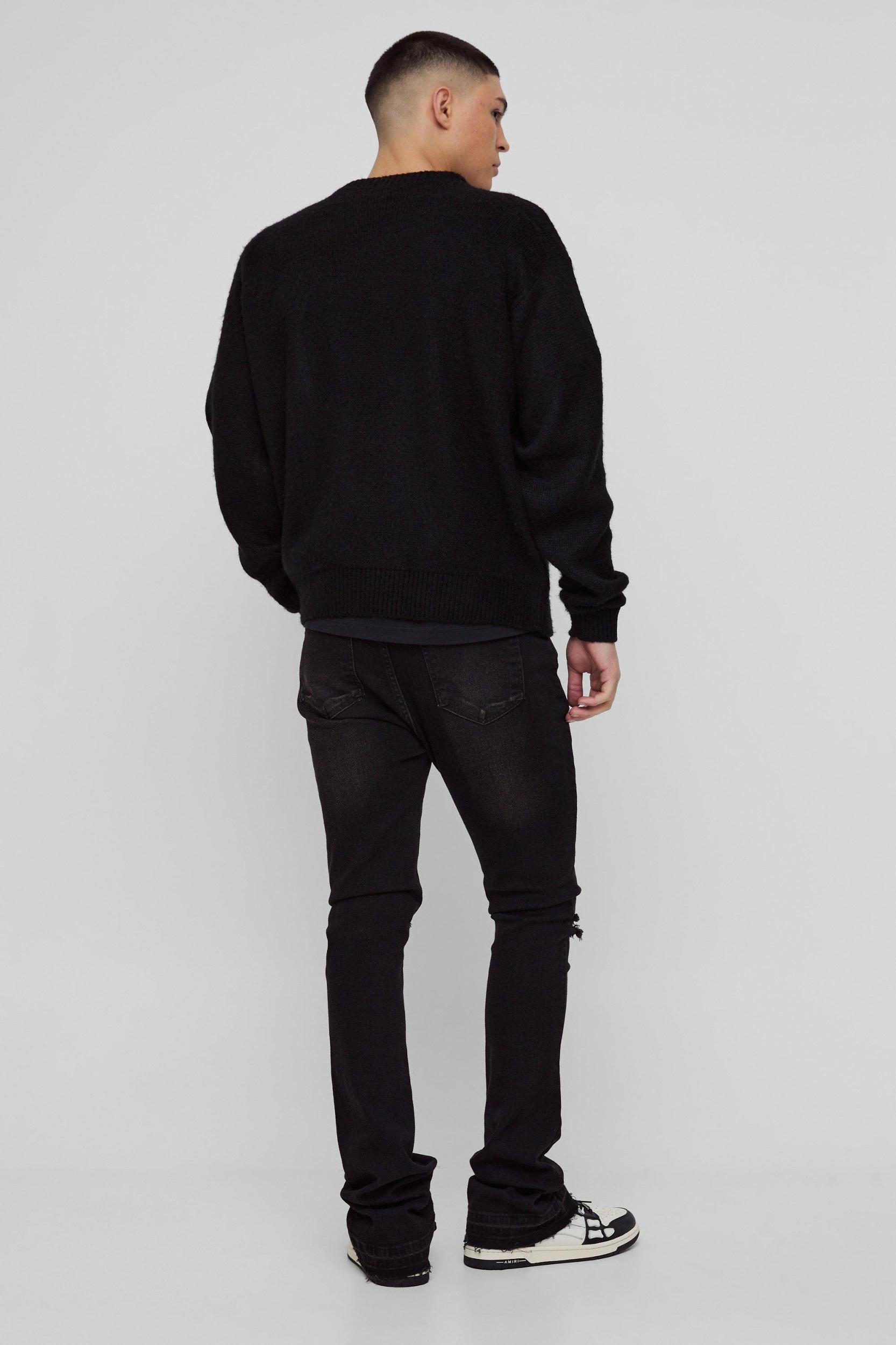Skinny Stacked Flared Ripped Knee Jeans | boohooMAN USA Product Image