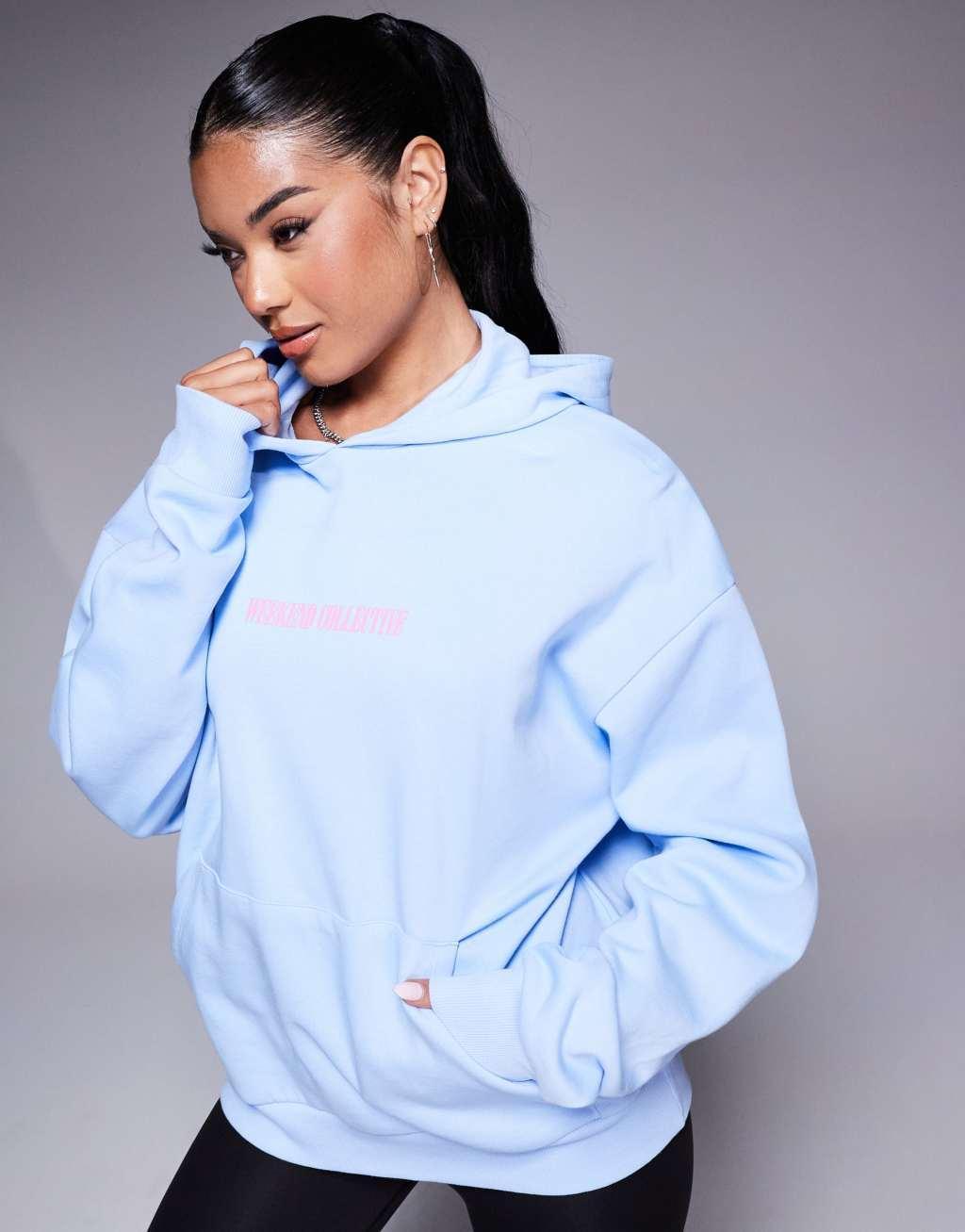 Weekend Collective oversized hoodie with pink stacked back logo in blue Product Image