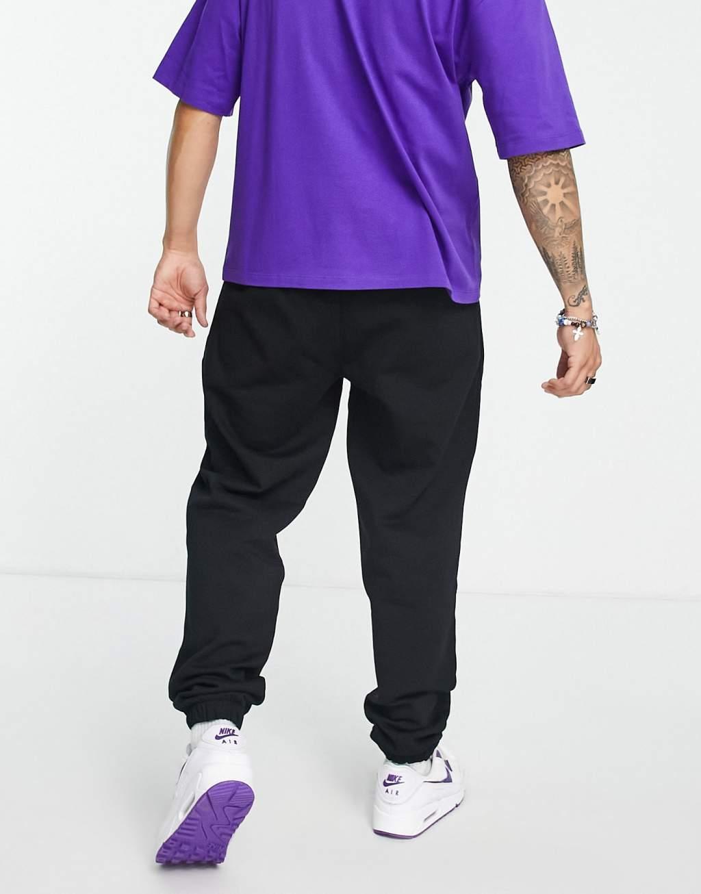 COLLUSION sweatpants in black Product Image