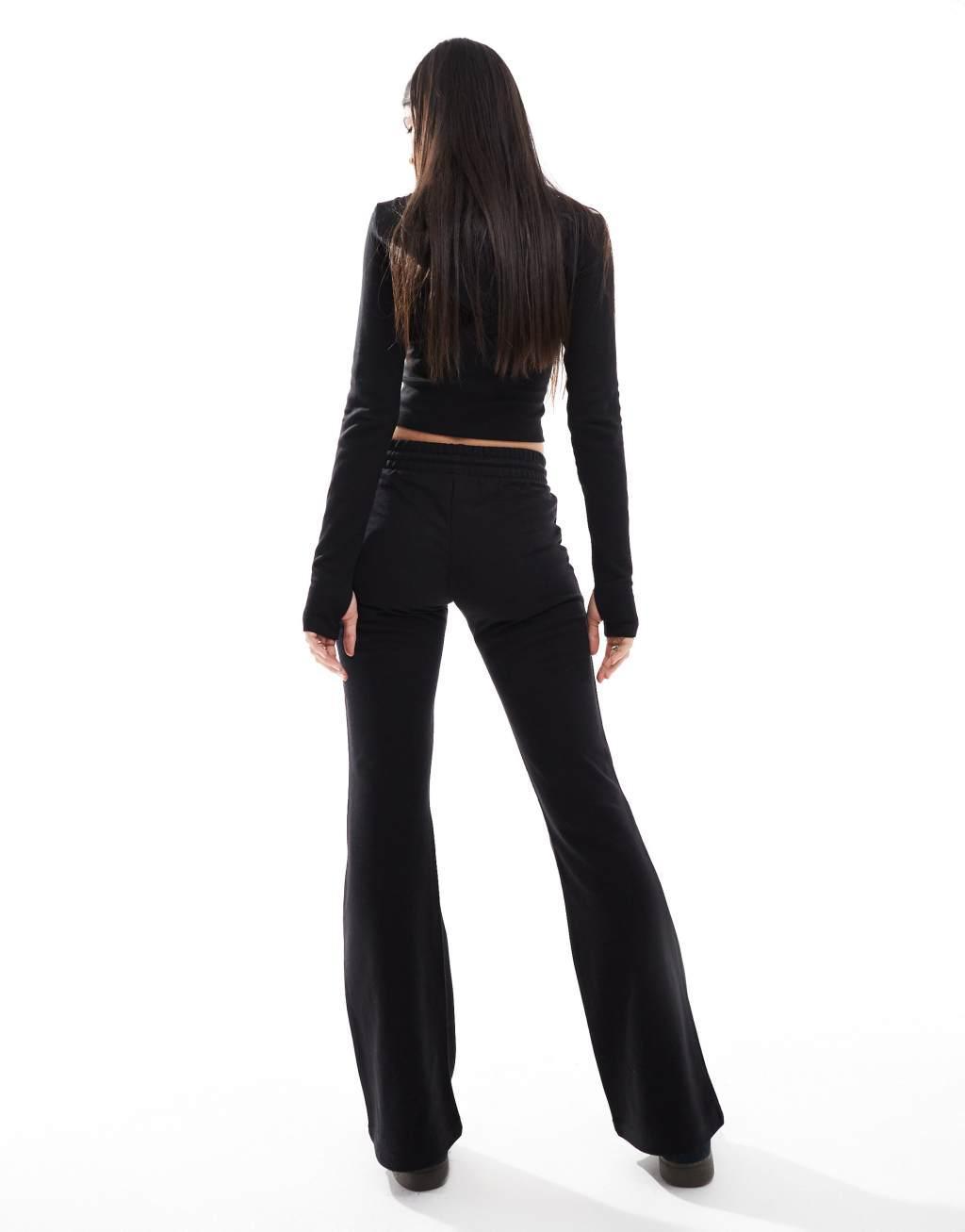 Bershka wide leg sweatpants in black Product Image