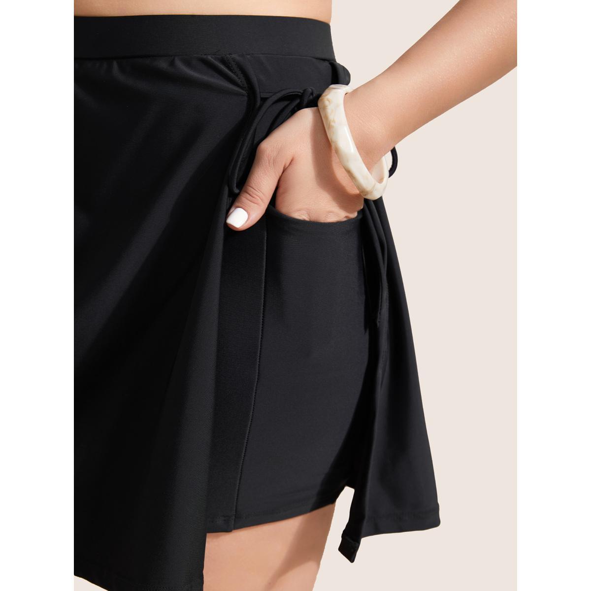 Plus Size High Rise Tie Knot Side Pocket Swim Bottom Women's Swimwear Indigo Beach Tie knot High stretch Bodycon High Rise Slanted pocket Curve Swim Bottoms BloomChic 10/M Product Image