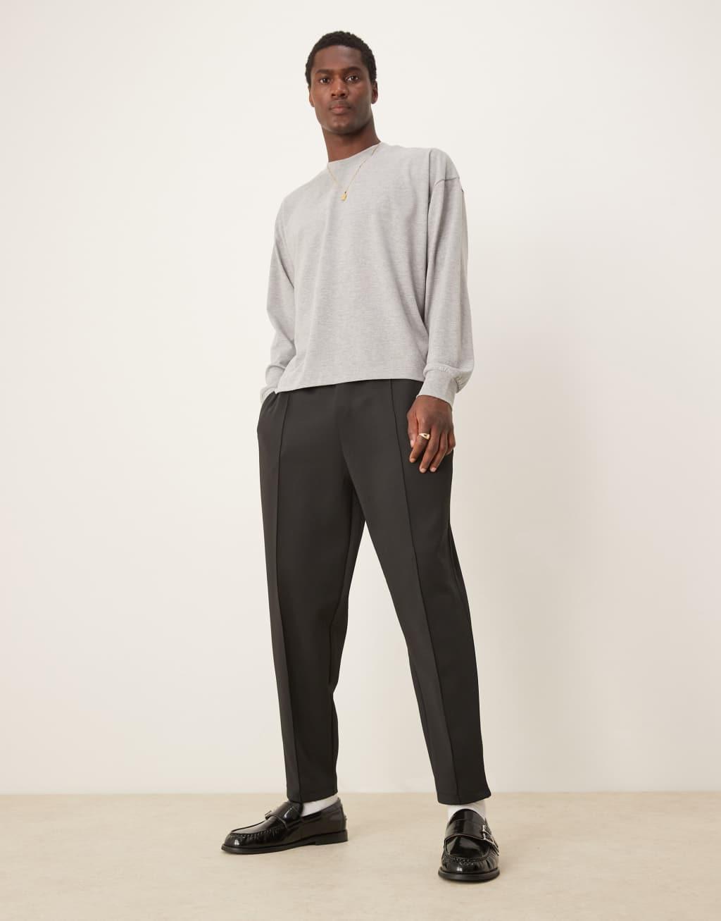 ASOS DESIGN relaxed tapered scuba sweatpants with pintucks in black Product Image