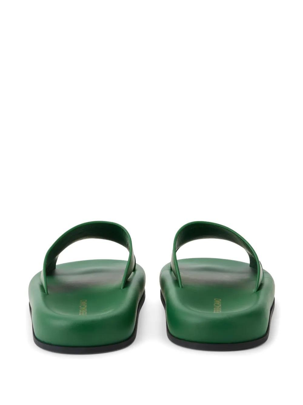 logo-embossed leather slides Product Image