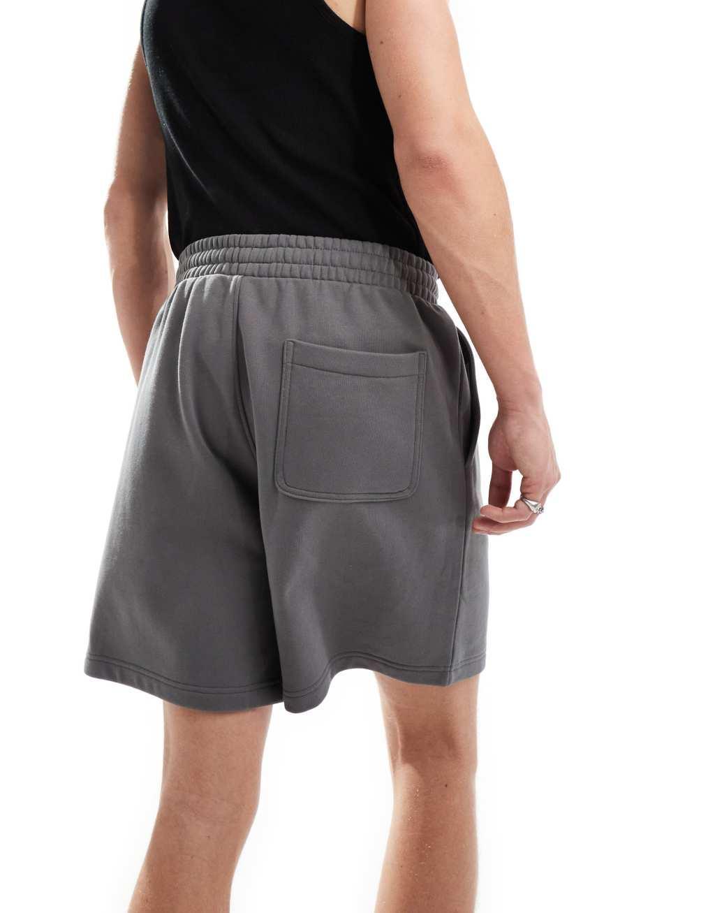 Weekday relaxed fit jersey shorts in off-black Product Image
