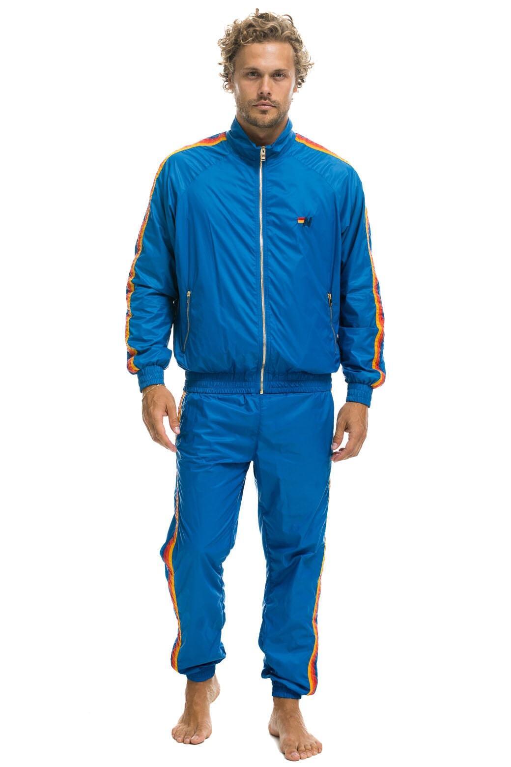 MEN'S 4 STRIPE WIND PANT - SNORKEL BLUE Male Product Image