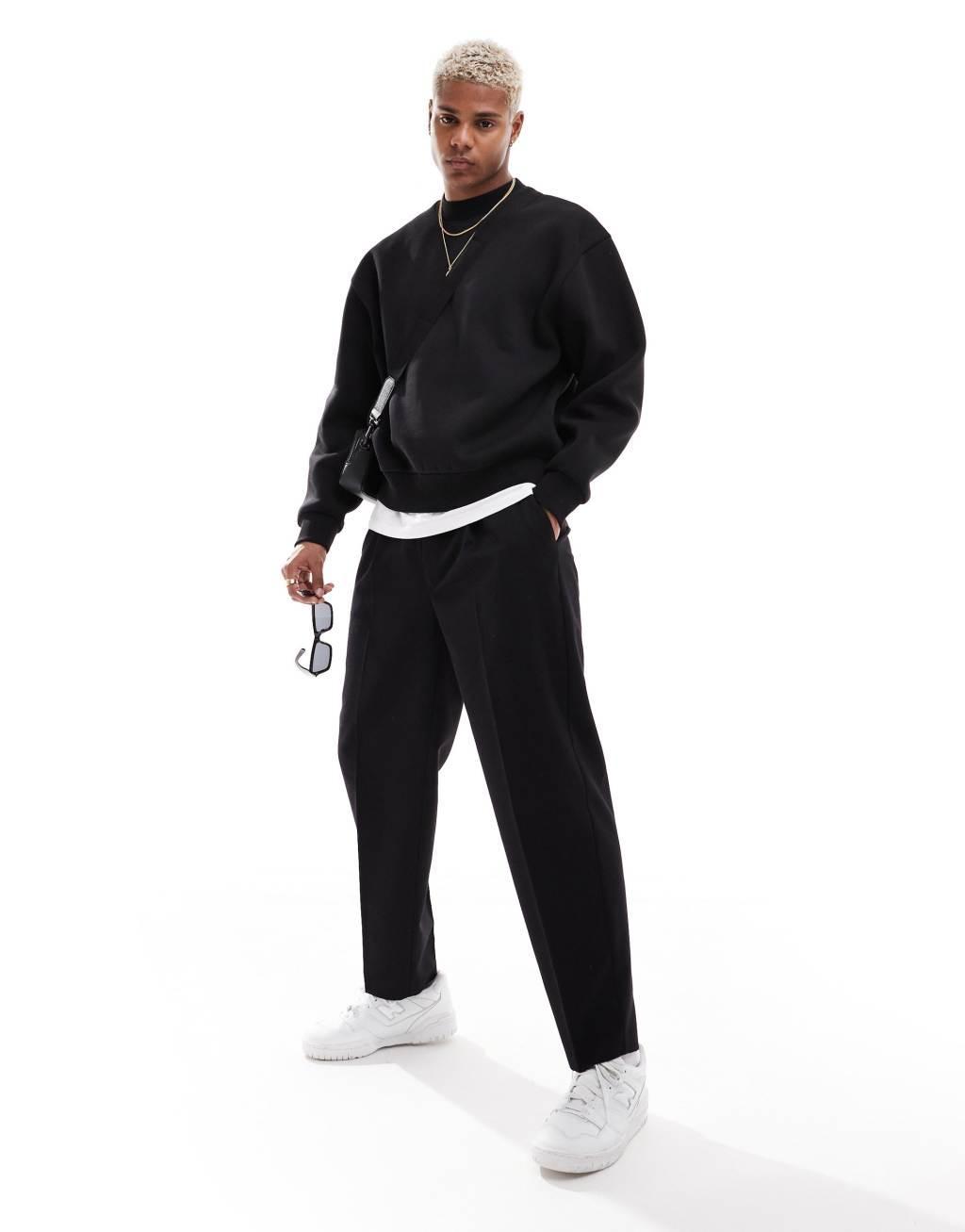 ASOS DESIGN boxy oversized sweatshirt in black Product Image