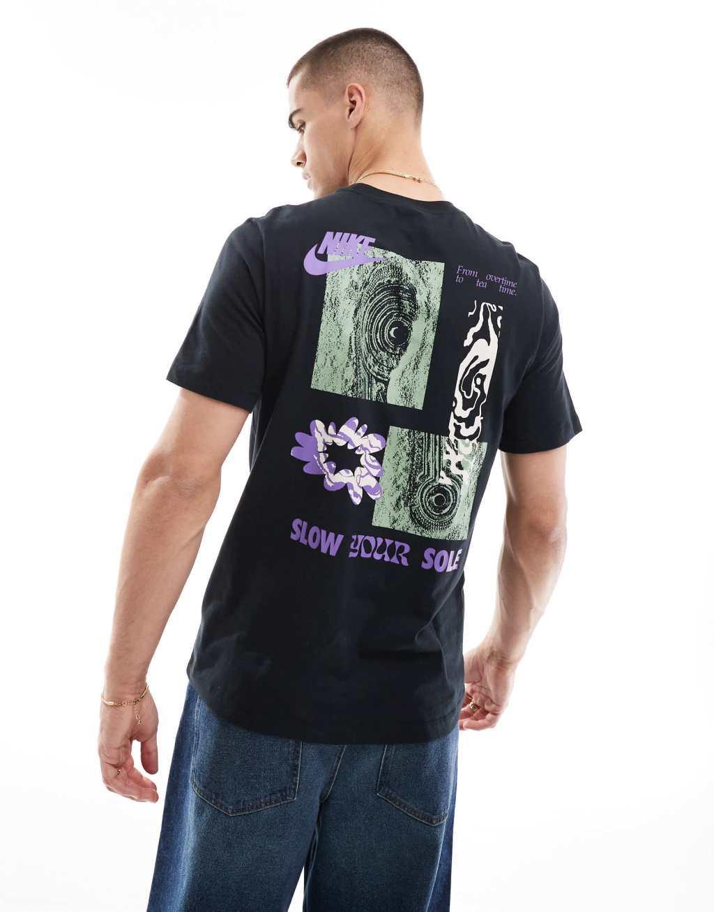 Nike Slow Your Sole graphic T-shirt in black Product Image