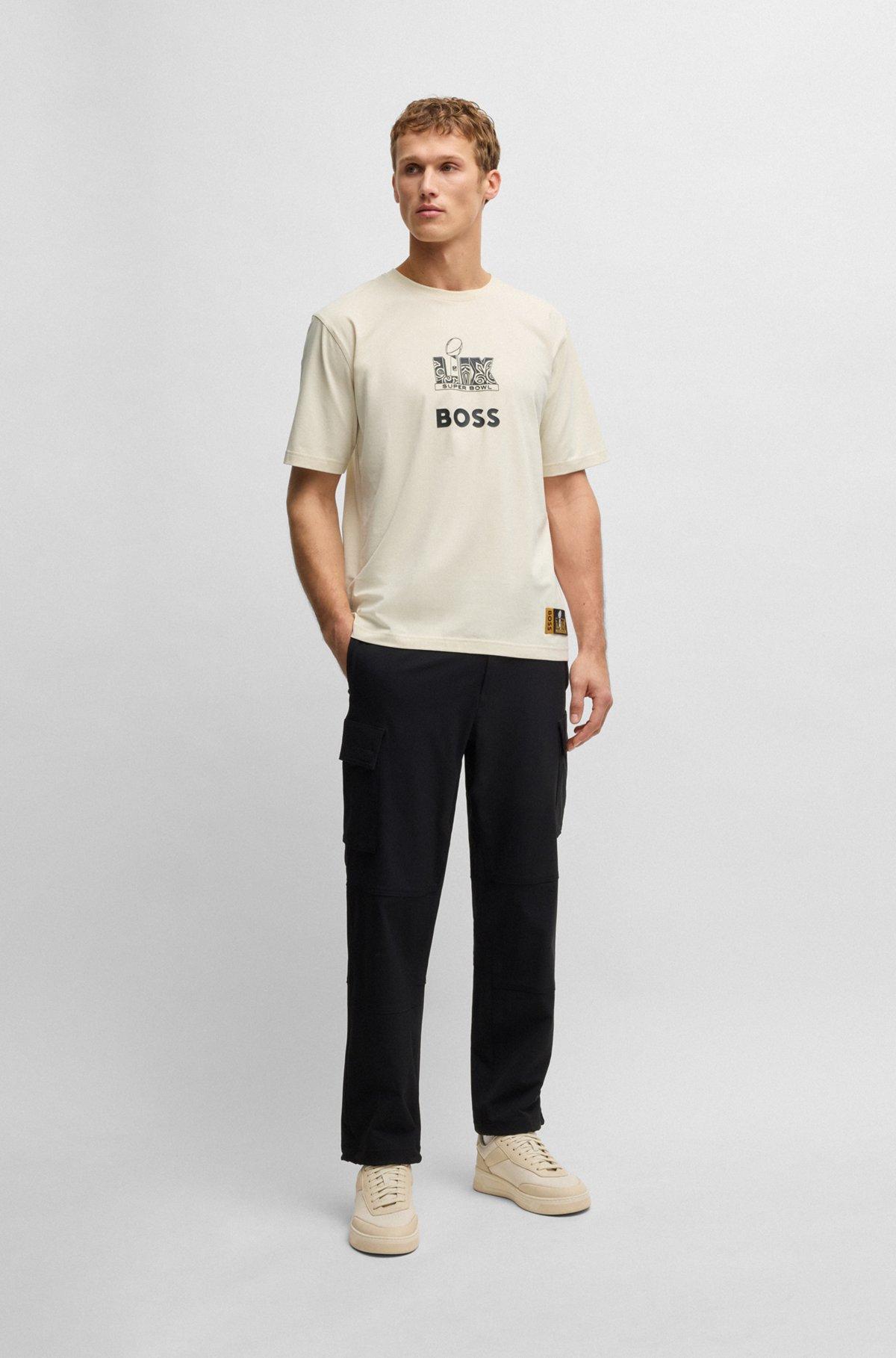 BOSS - BOSS x NFL stretch-cotton T-shirt with gold-tone artwork - Black Product Image