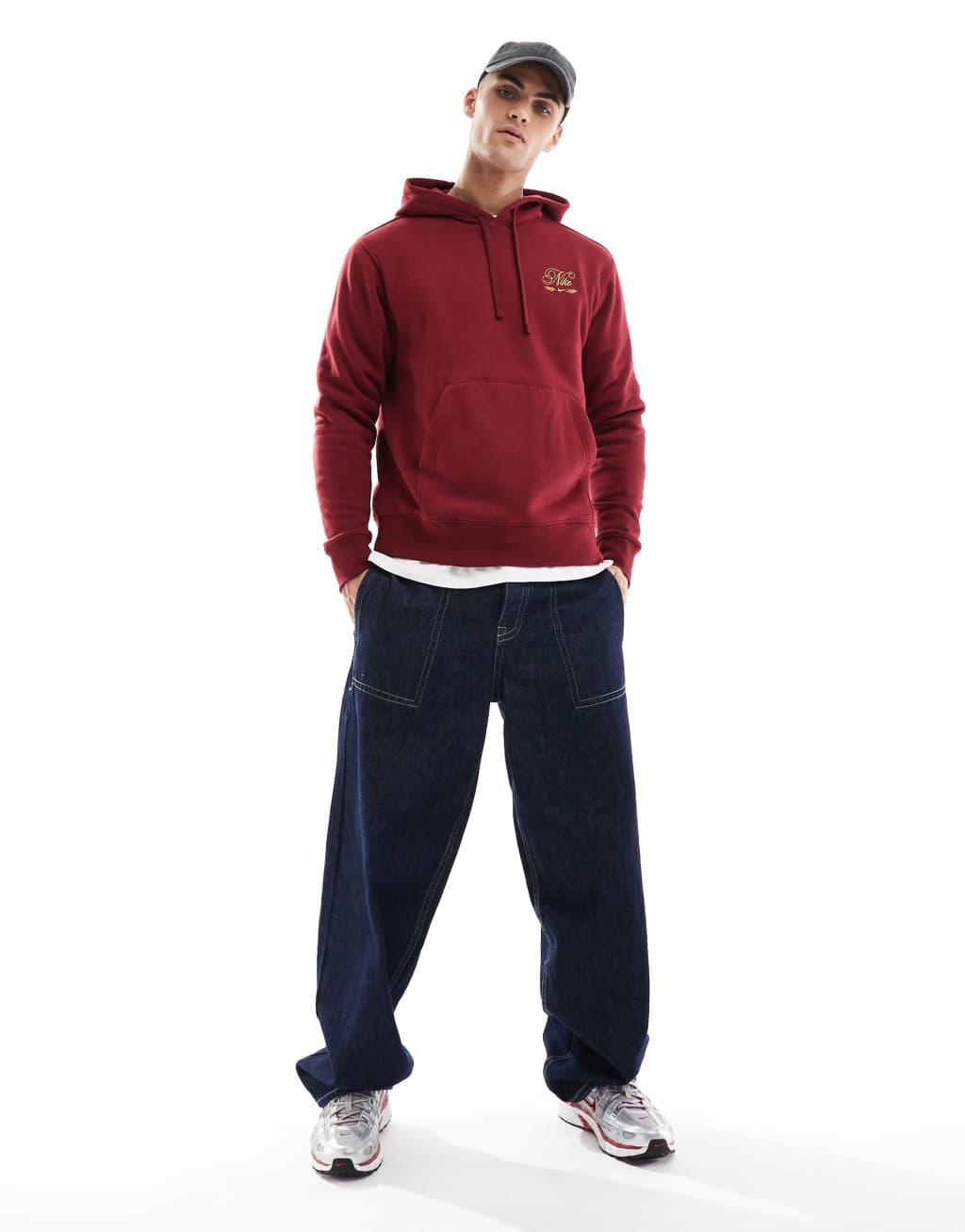 Nike 'Tis The Season logo hoodie in red Product Image