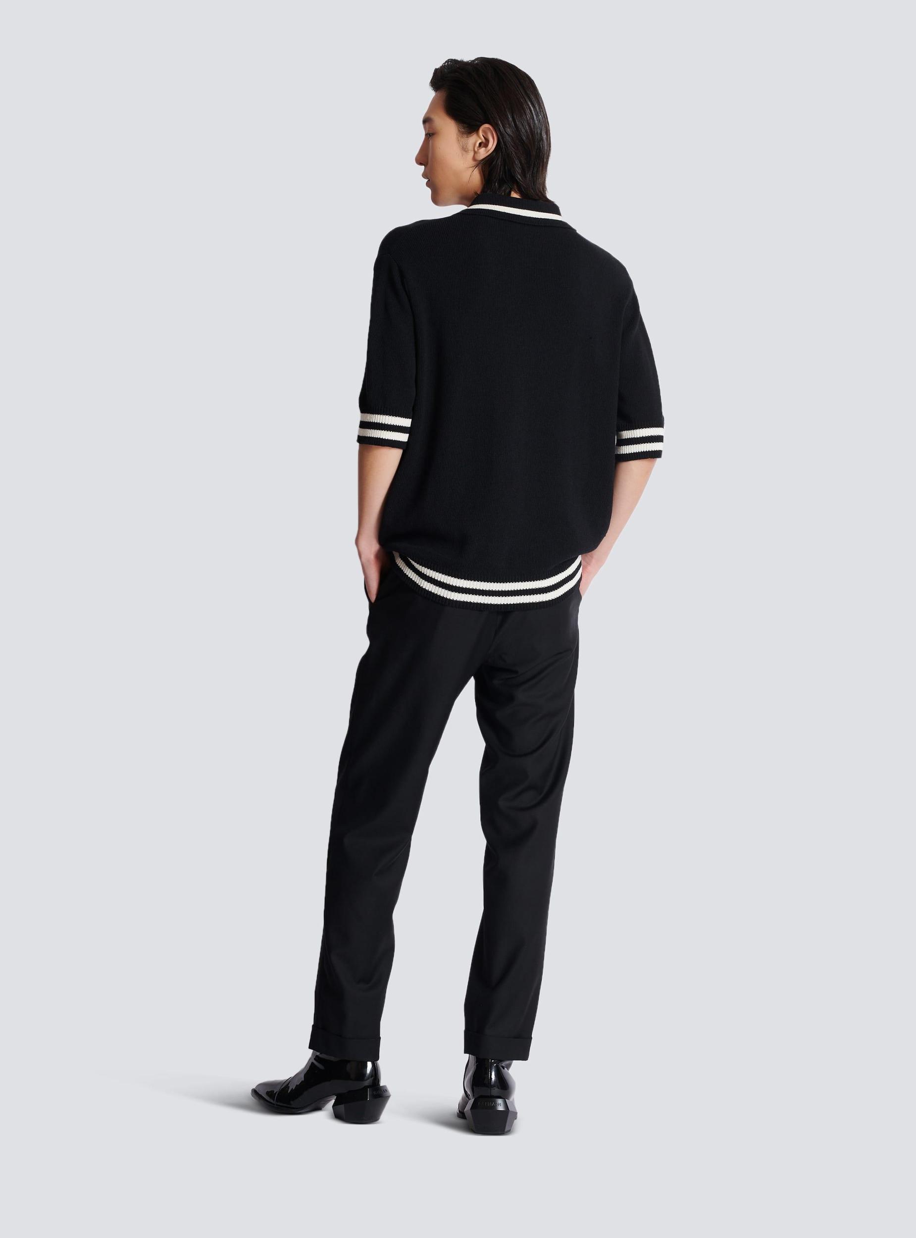 Wool polo shirt with Balmain Signature embroidery Product Image