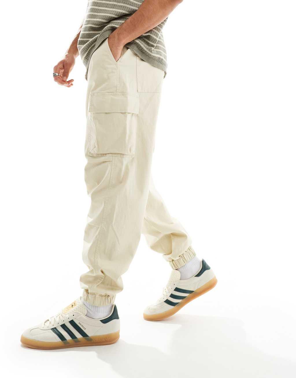 ASOS DESIGN oversized tapered cargo pants in stone Product Image