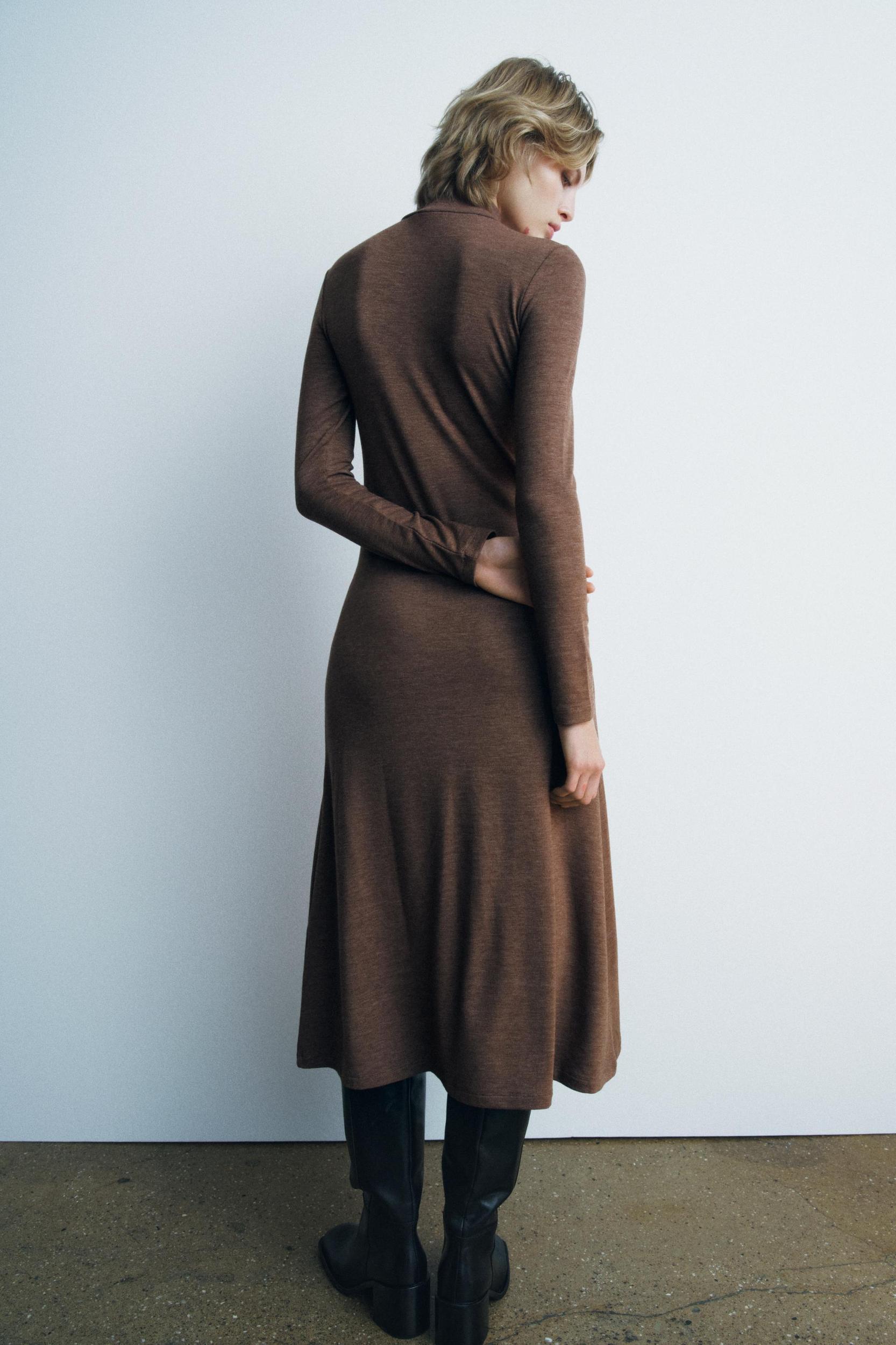 Midi turtleneck dress with long sleeves. A-line silhouette. Product Image