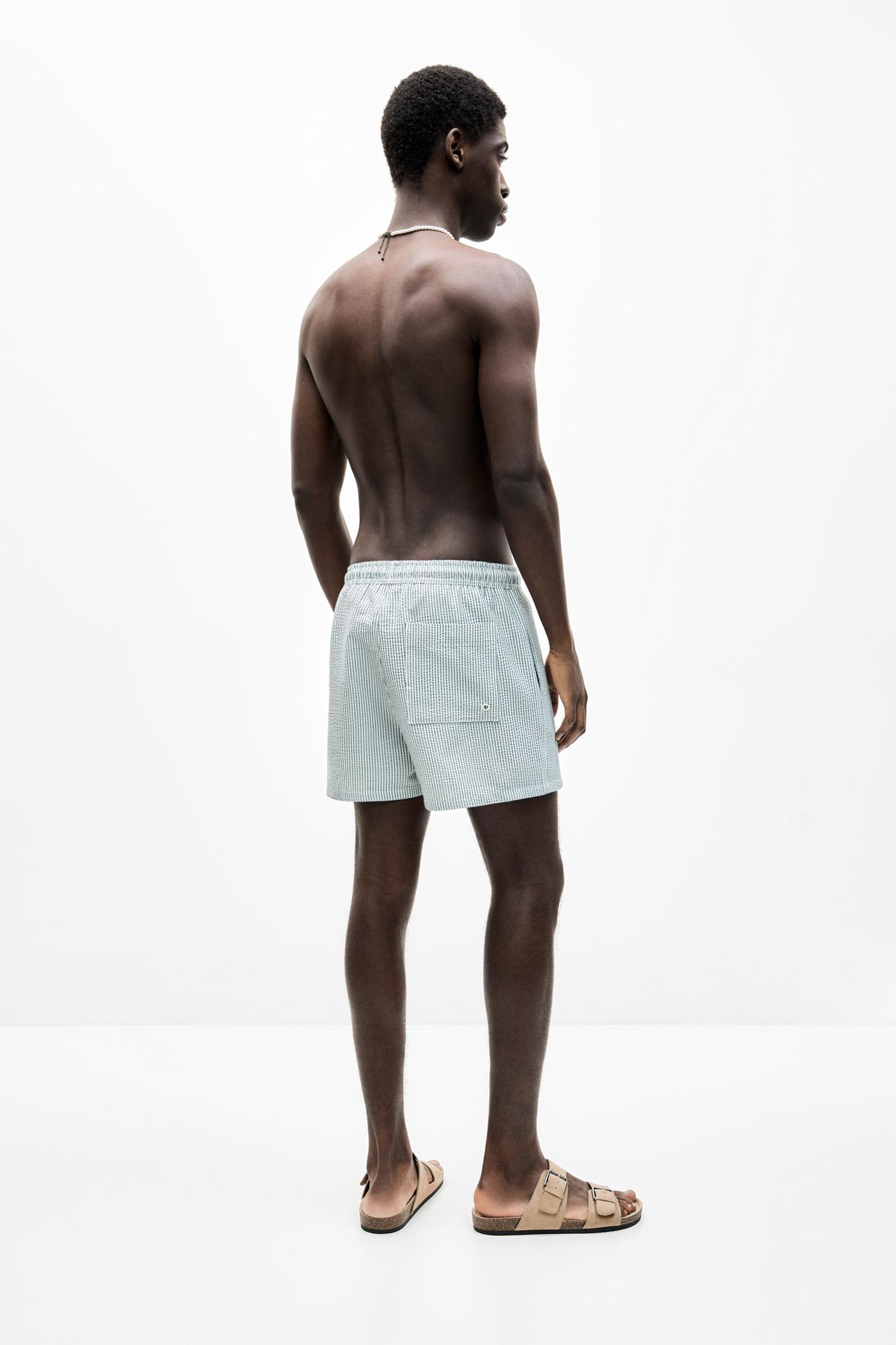 Striped seersucker swimming trunks Product Image