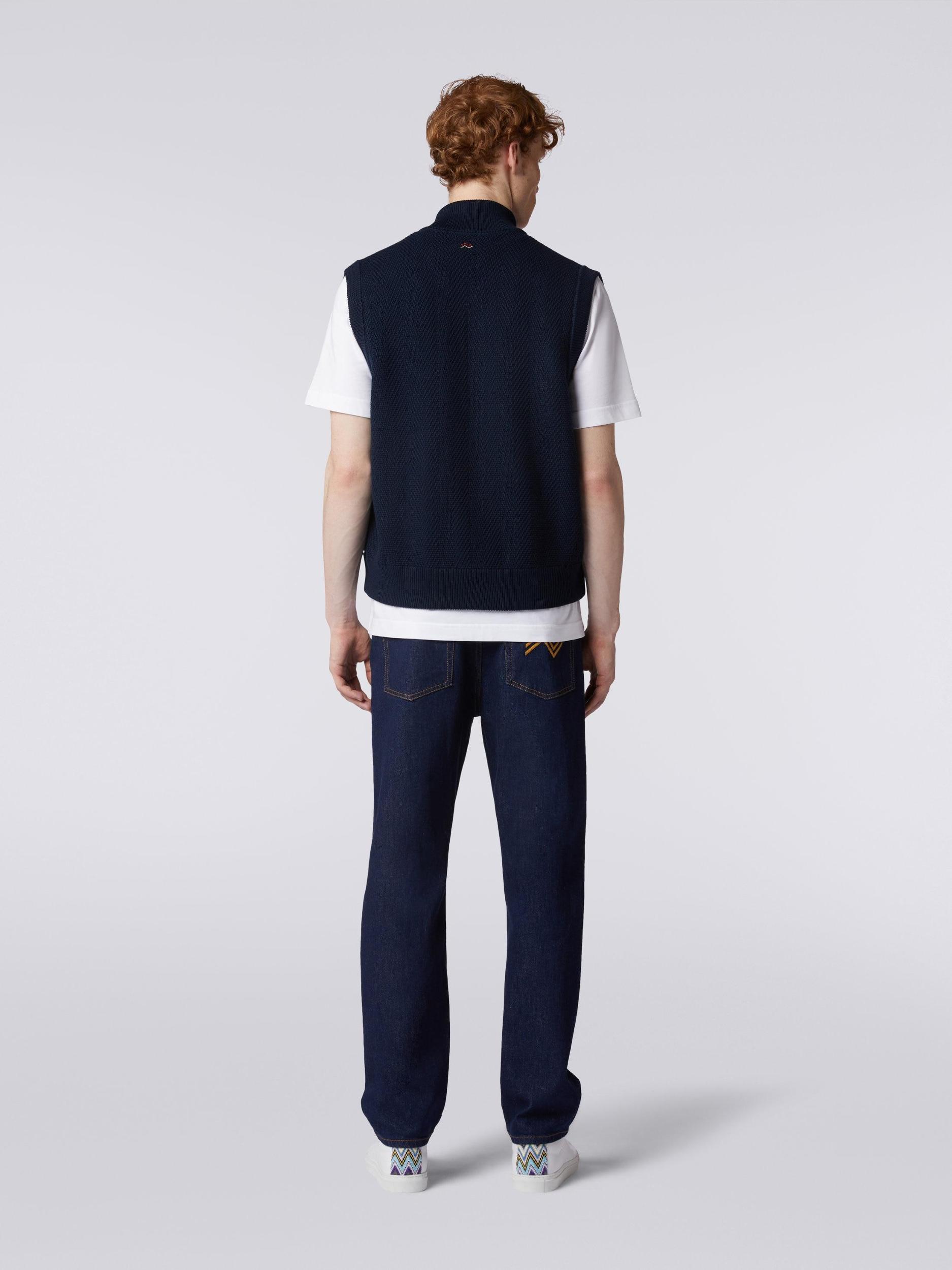 Zigzag stitched waistcoat with knitted back and piping Product Image
