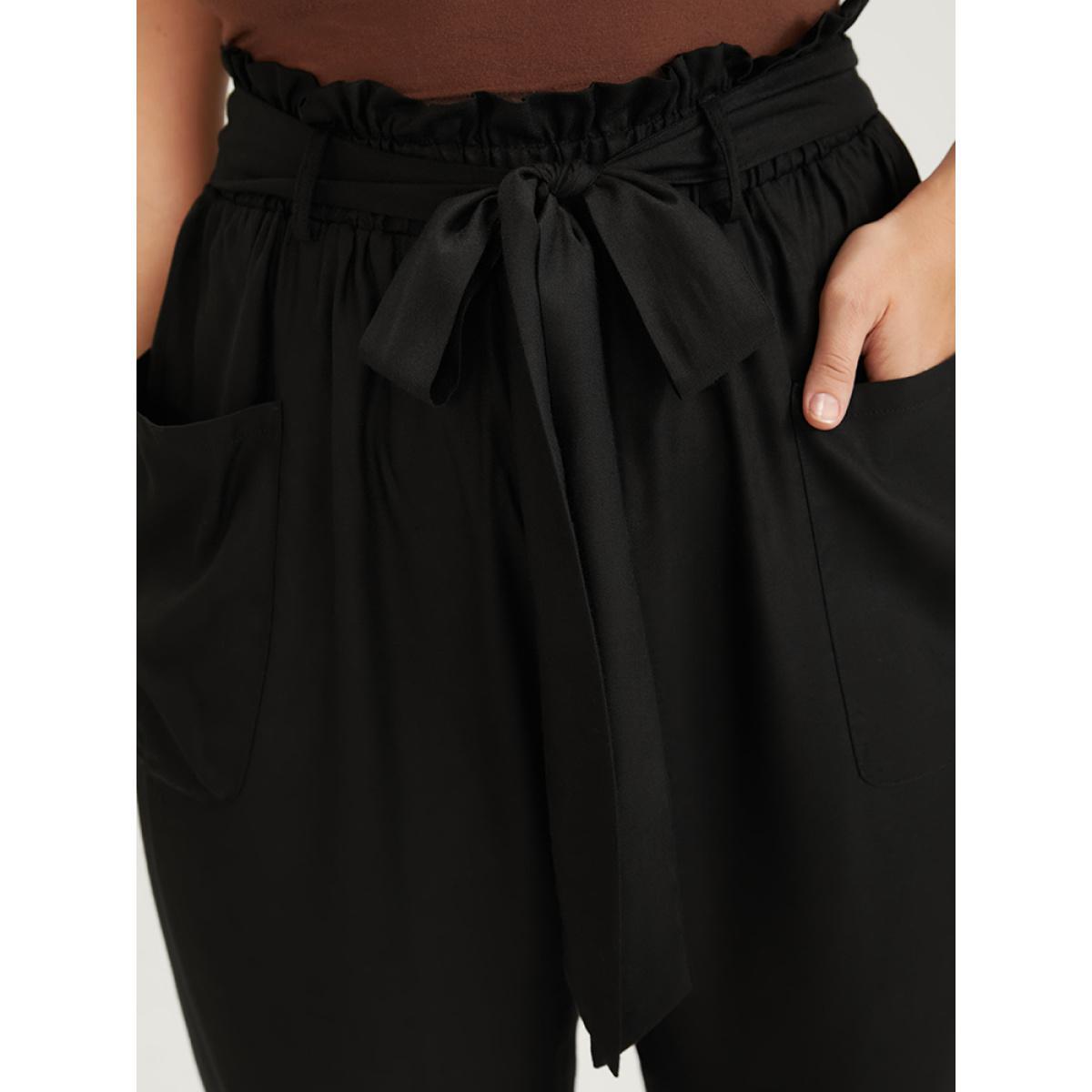 Plus Size Solid Pocket Front Paperbag Waist Belted Pants Women Black Casual High Rise Dailywear Pants BloomChic 30/6X Product Image