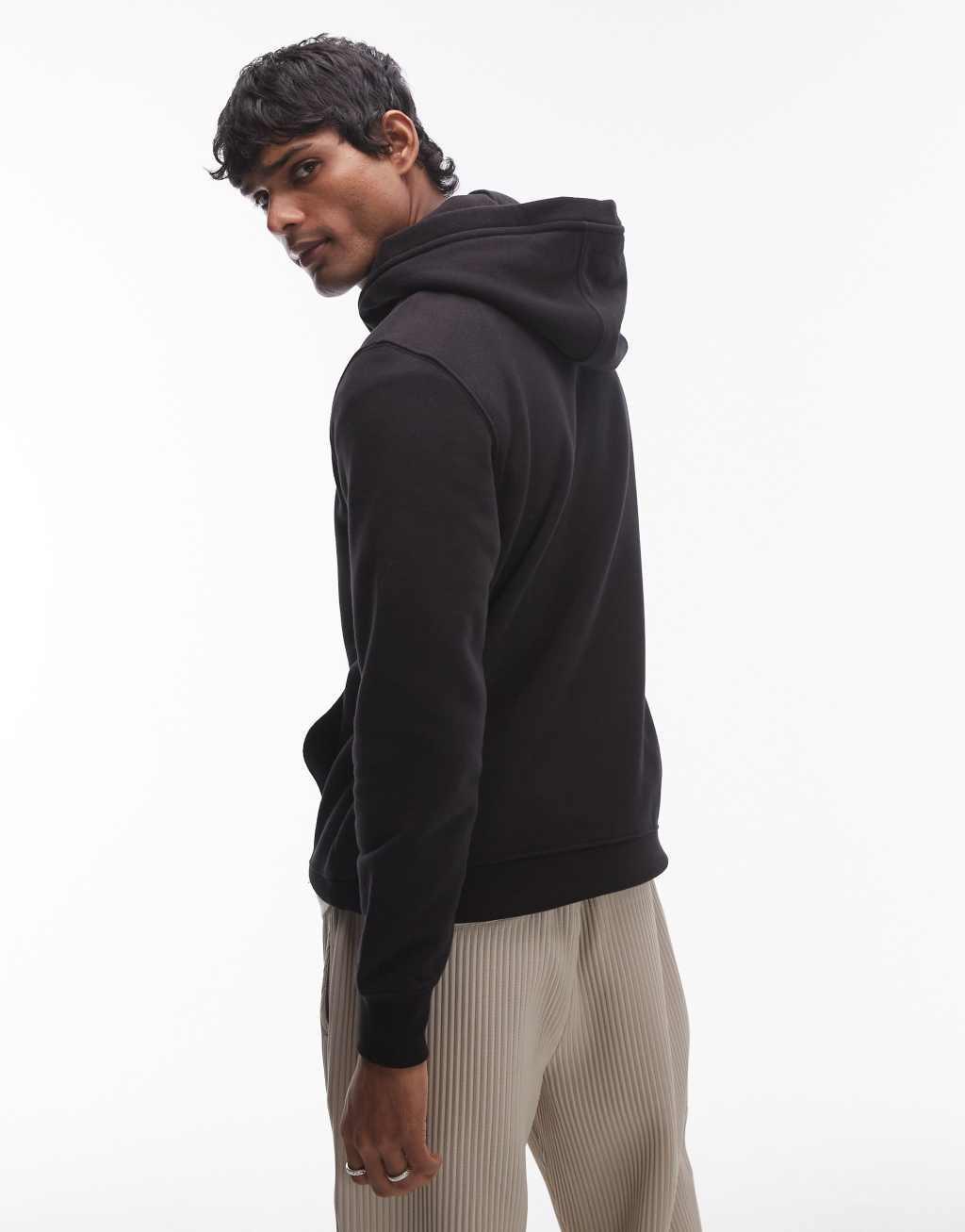 Tommy Hilfiger large logo hoodie in black Product Image