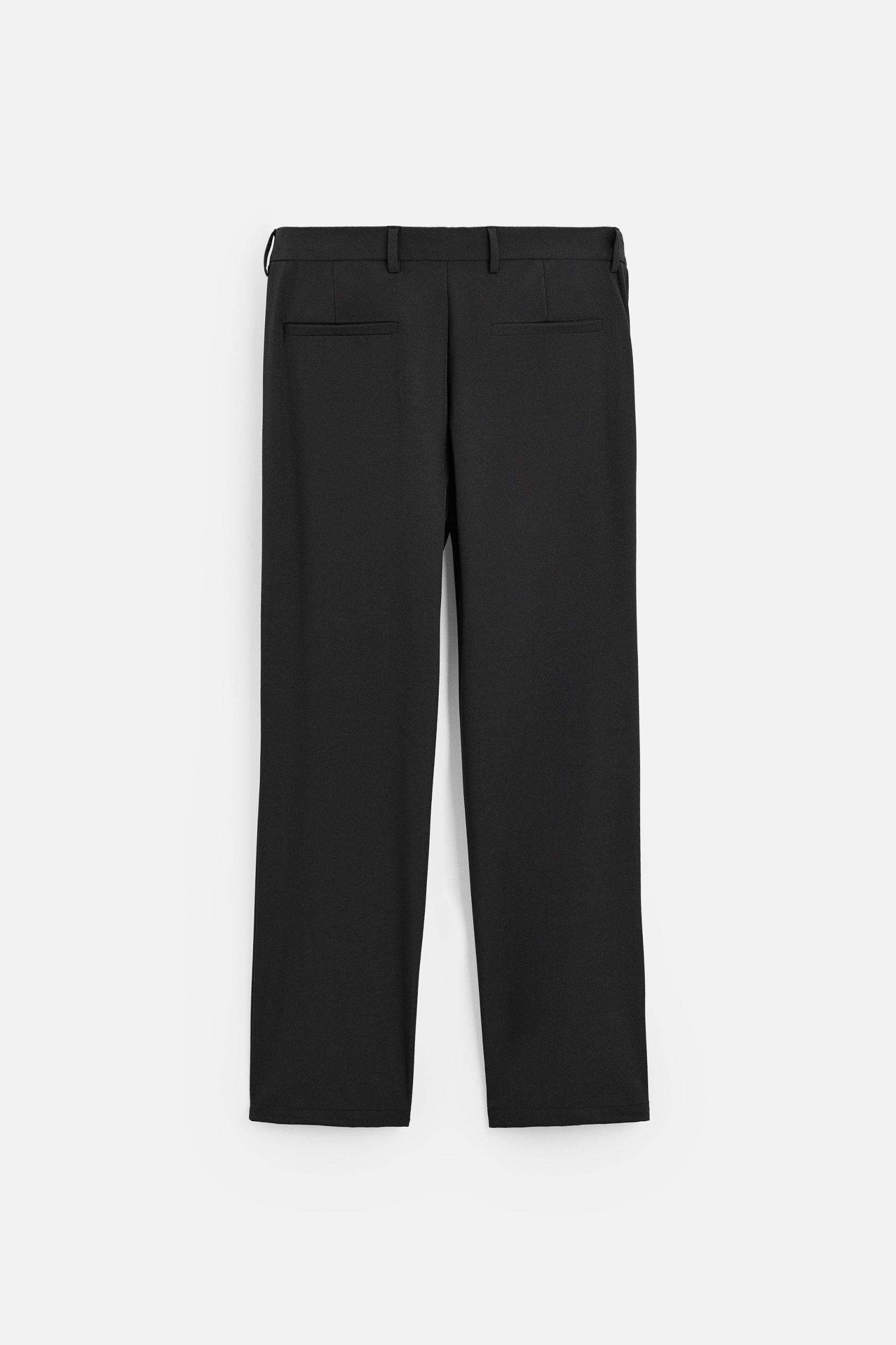 RELAXED FIT PLEATED PANTS Product Image
