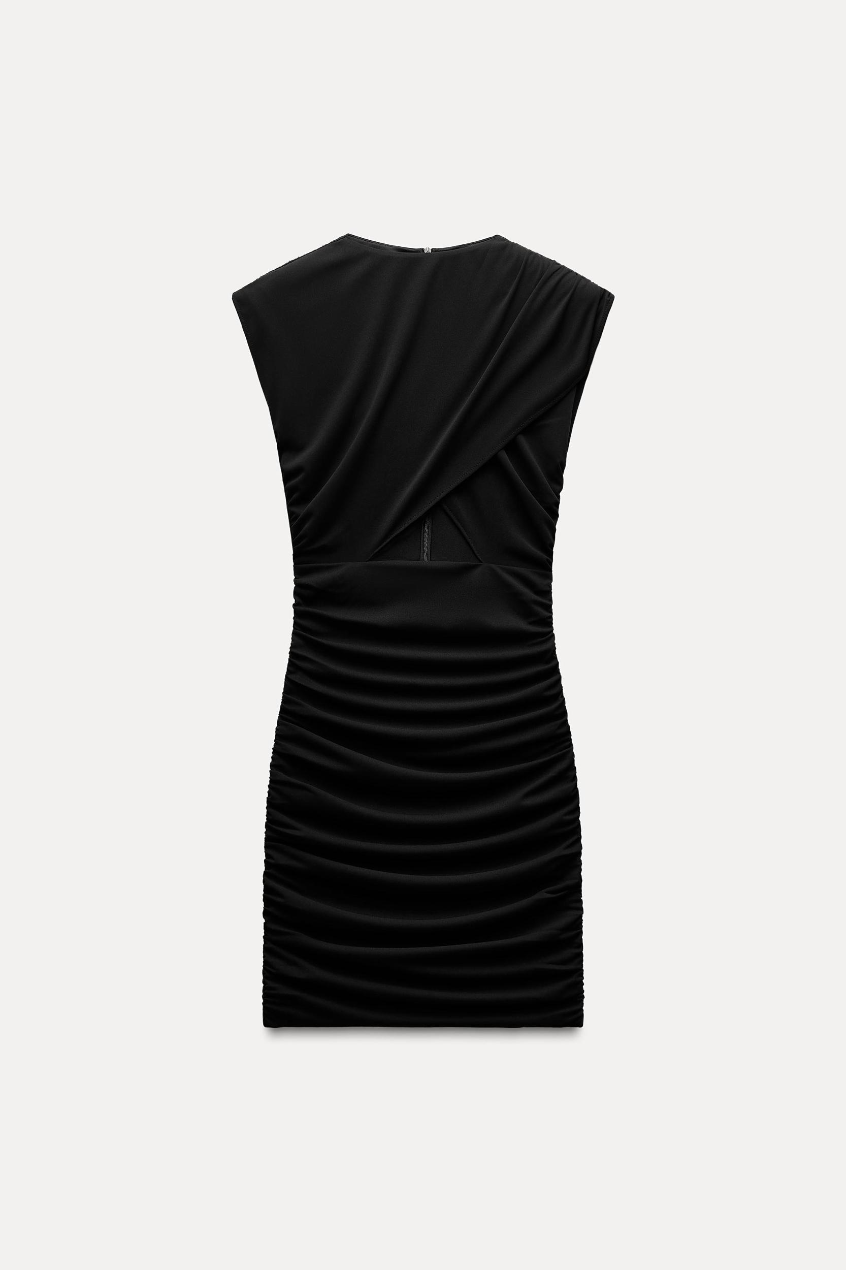 DRAPED SHOULDER PAD CUT OUT DRESS Product Image