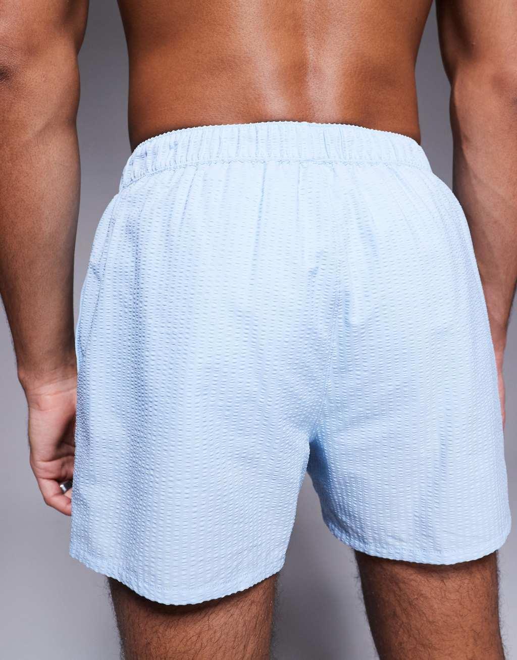 ASOS DESIGN seersucker swim shorts in short length with embroidery   Product Image