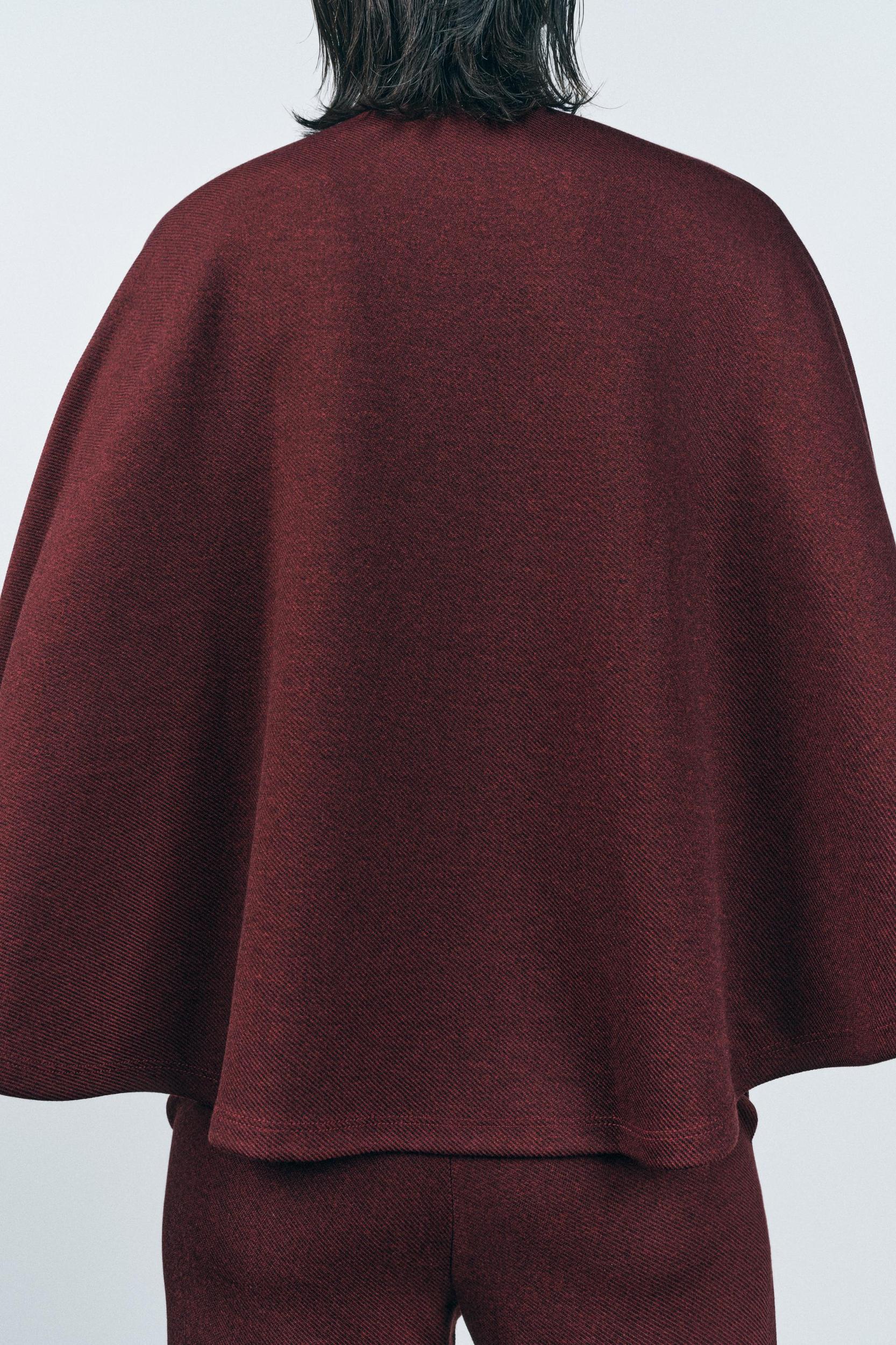 BUTTON CAPE Product Image