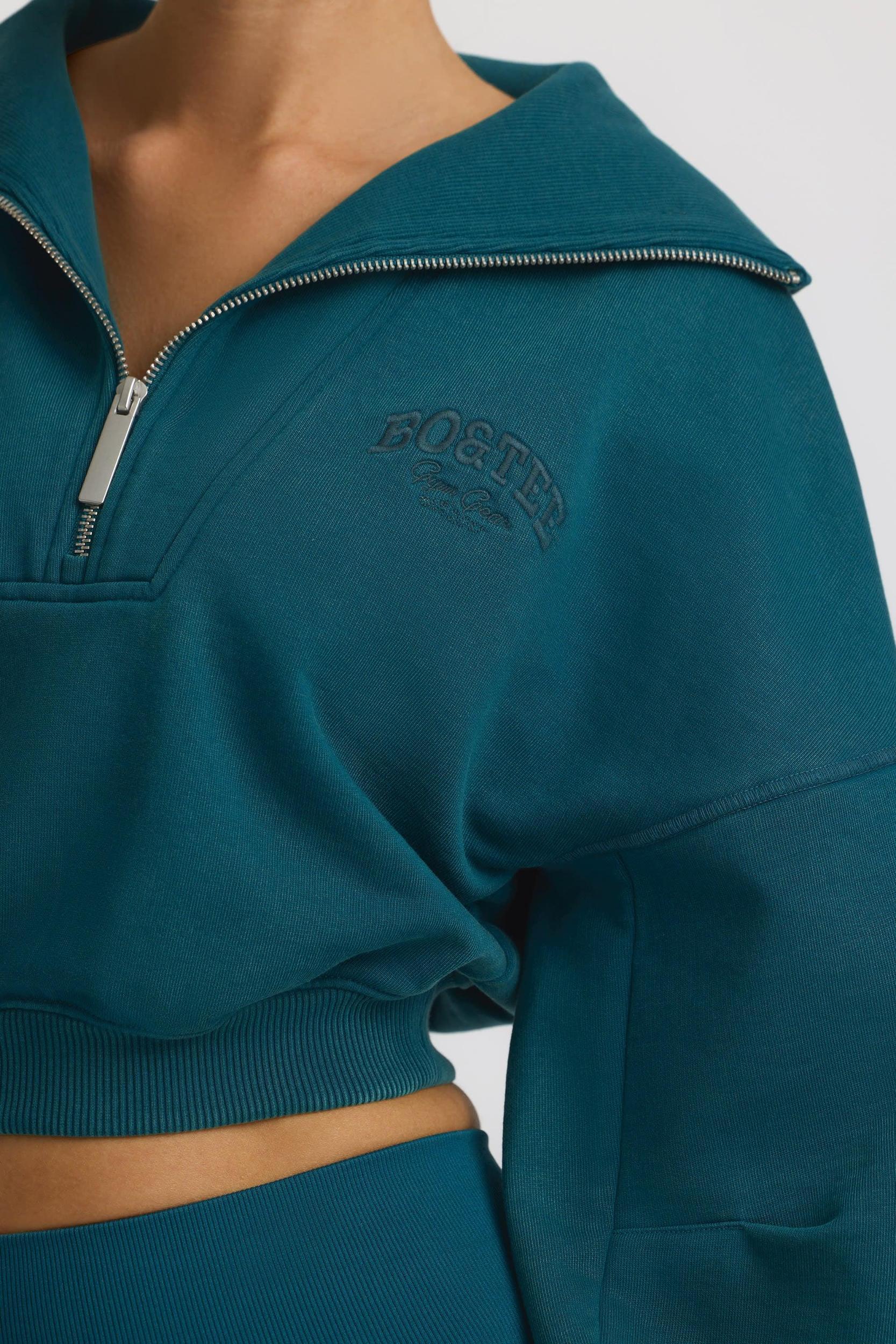 Quarter-Zip Cropped Sweatshirt in Teal Product Image