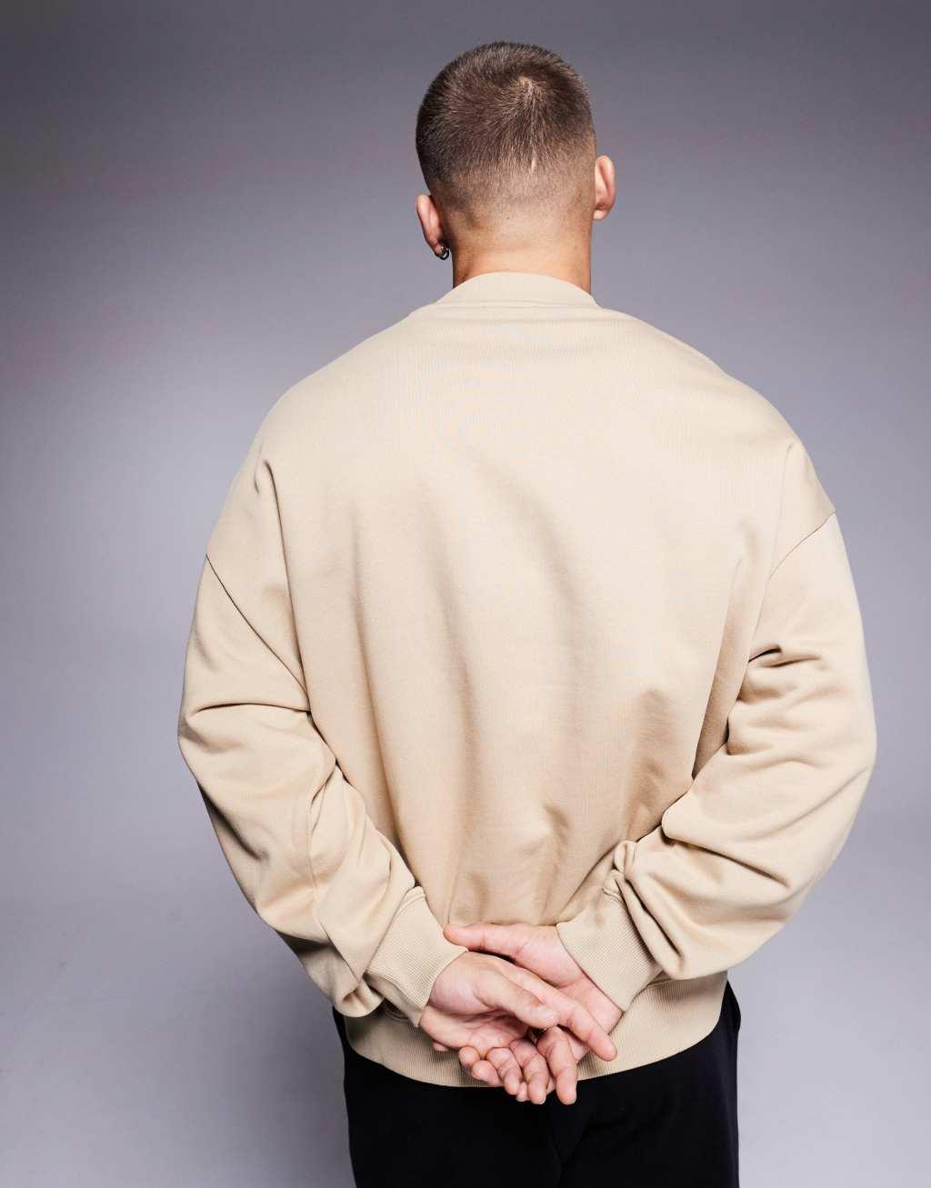 HUGO Blue Noideryos loose fit sweatshirt with line logo in beige Product Image