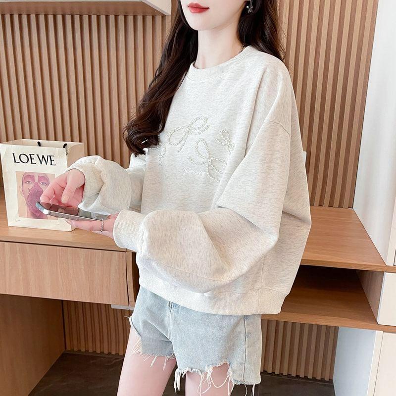 Crew Neck Faux Pearl Bow Pullover Product Image
