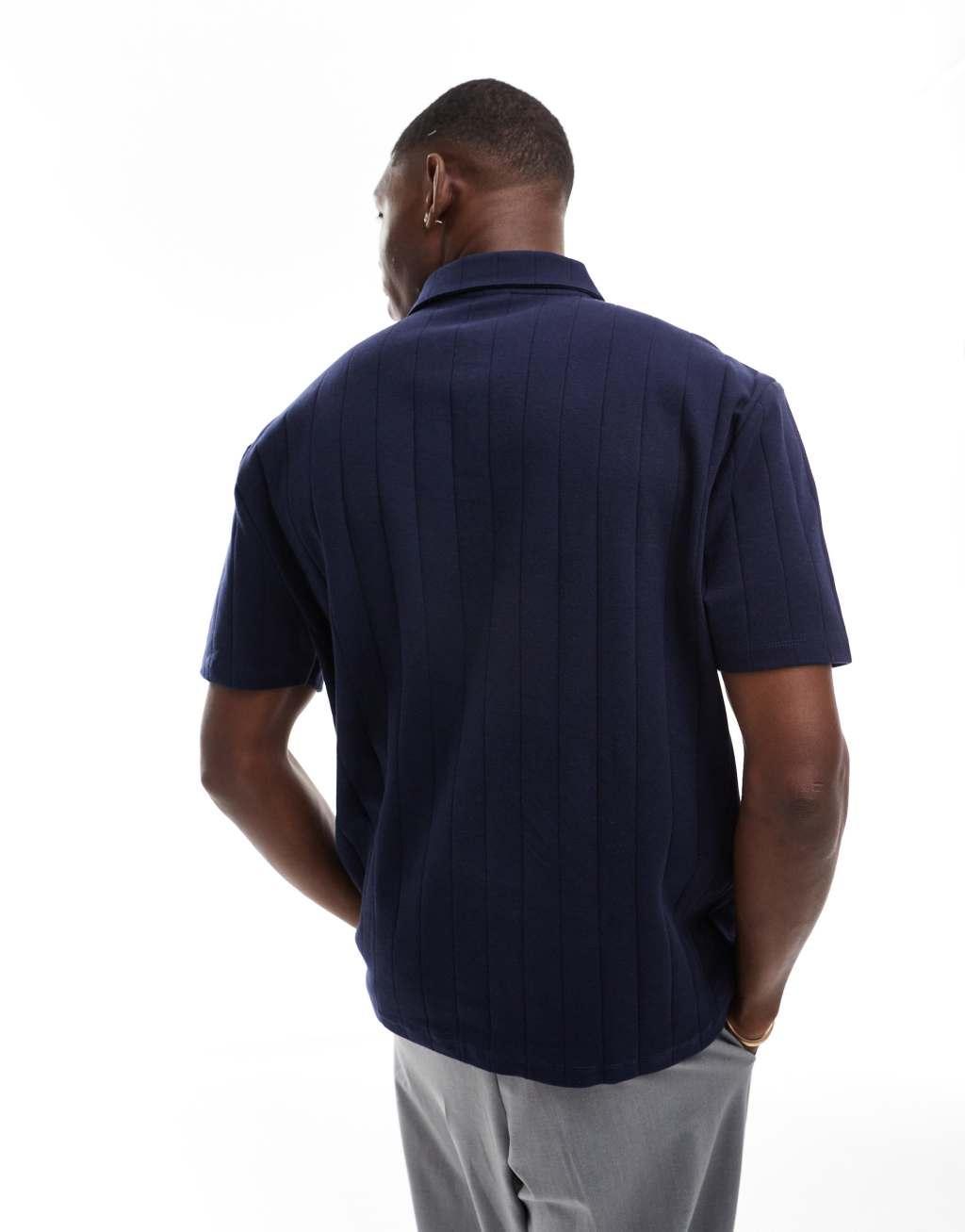 ASOS DESIGN relaxed polo with wide set rib in navy Product Image