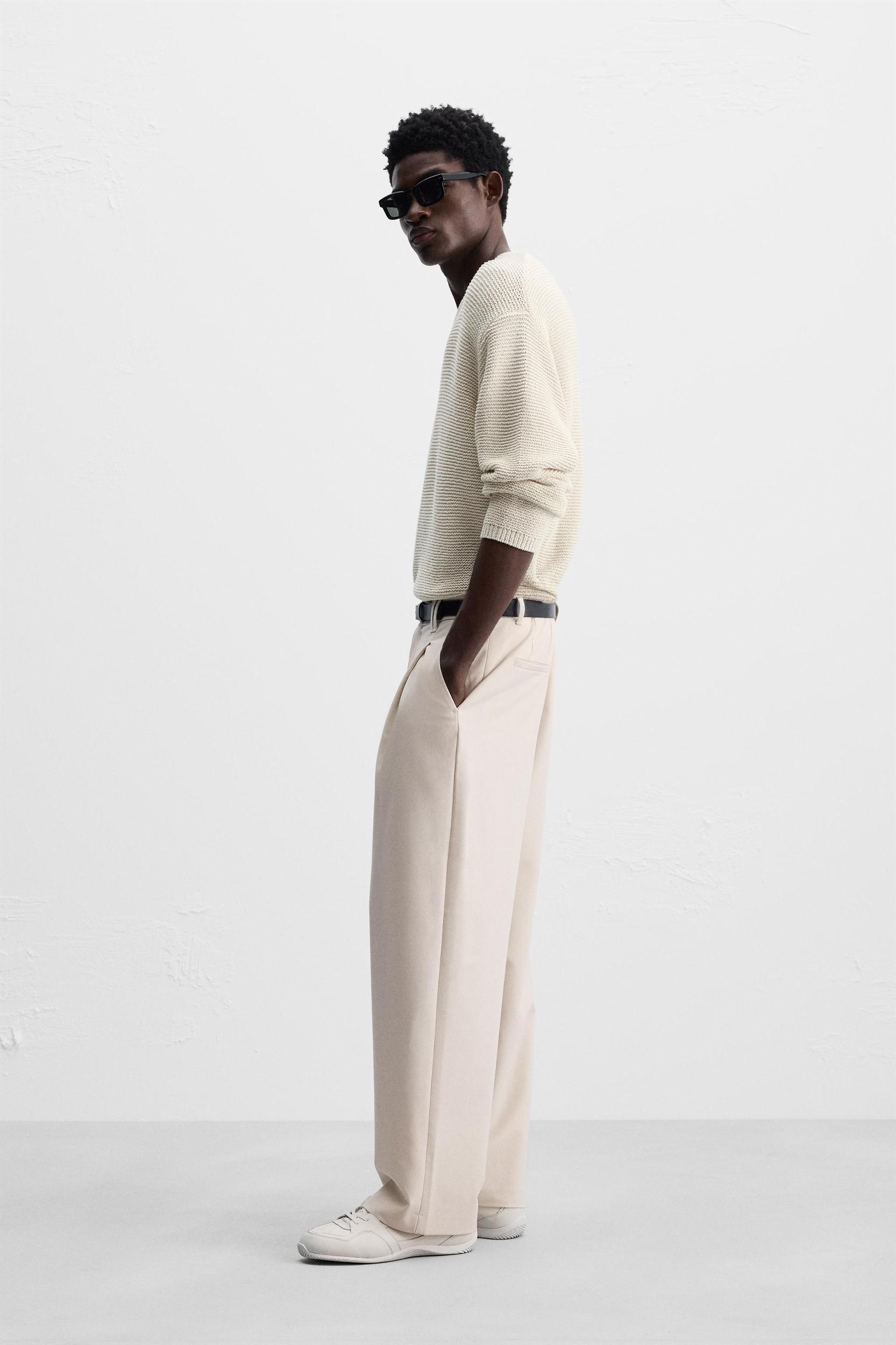 RELAXED FIT PLEATED PANTS Product Image