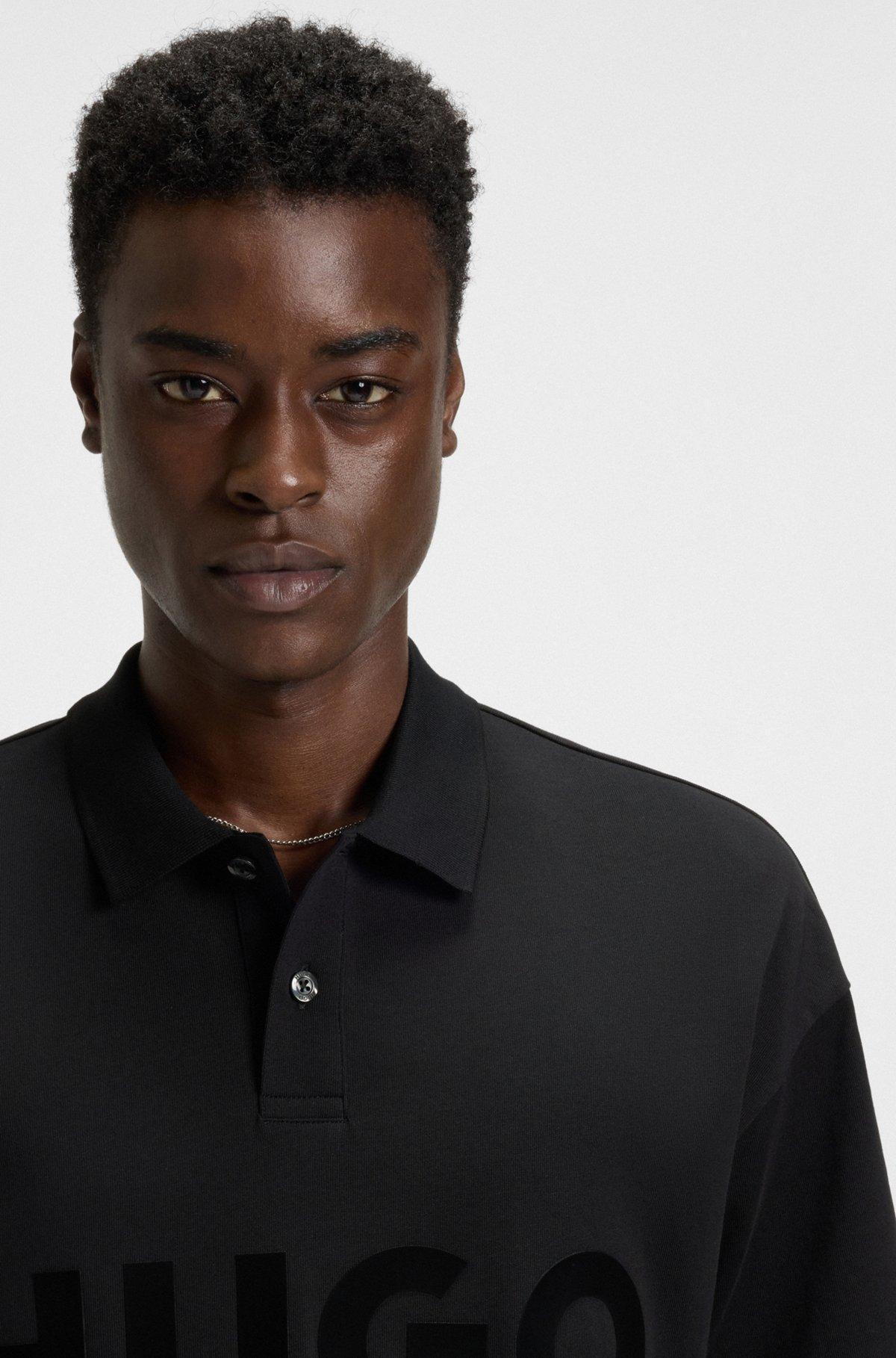 Oversize-fit cotton polo shirt with tonal logo print Product Image