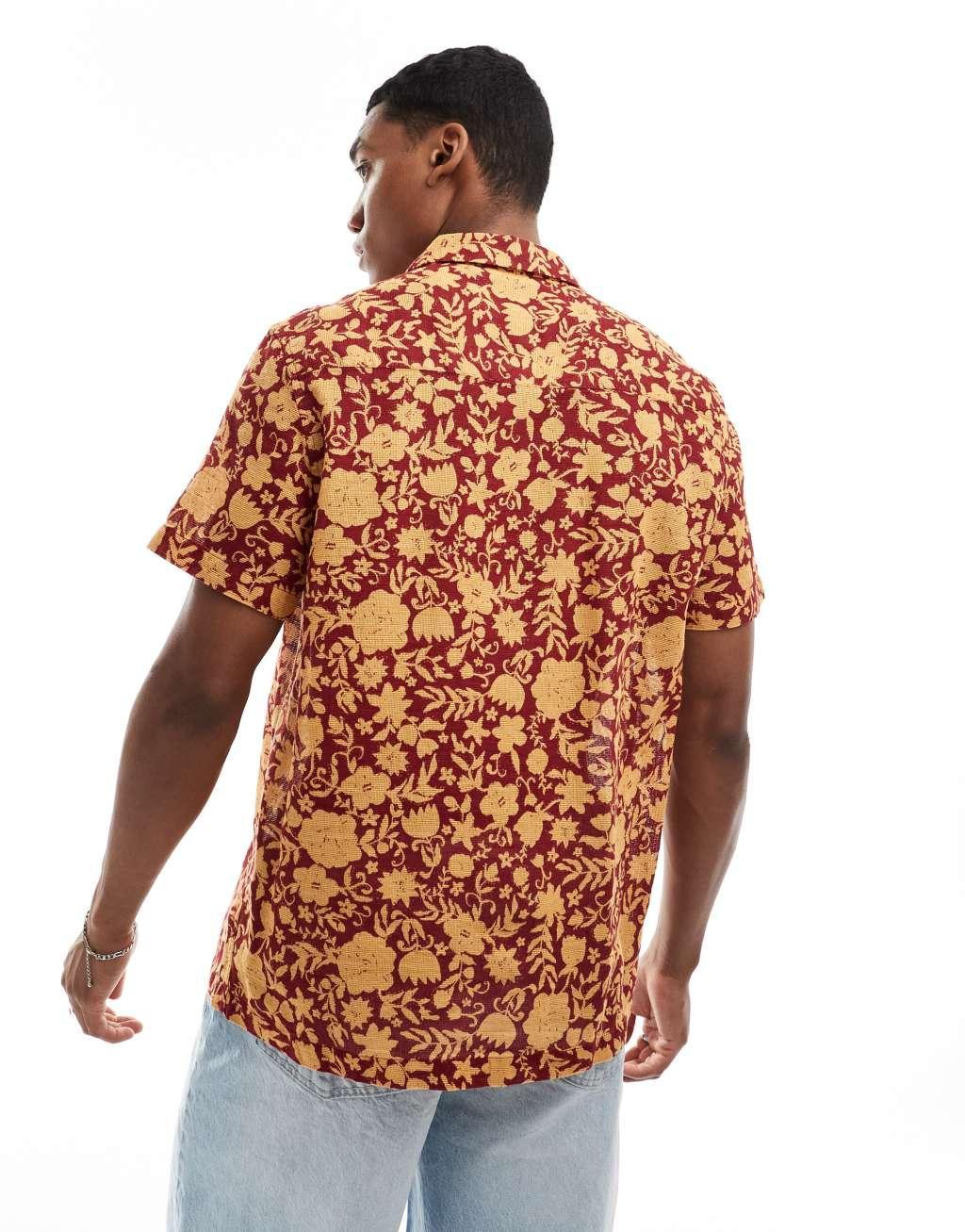 ASOS DESIGN relaxed camp collar textured shirt in orange and red floral print Product Image
