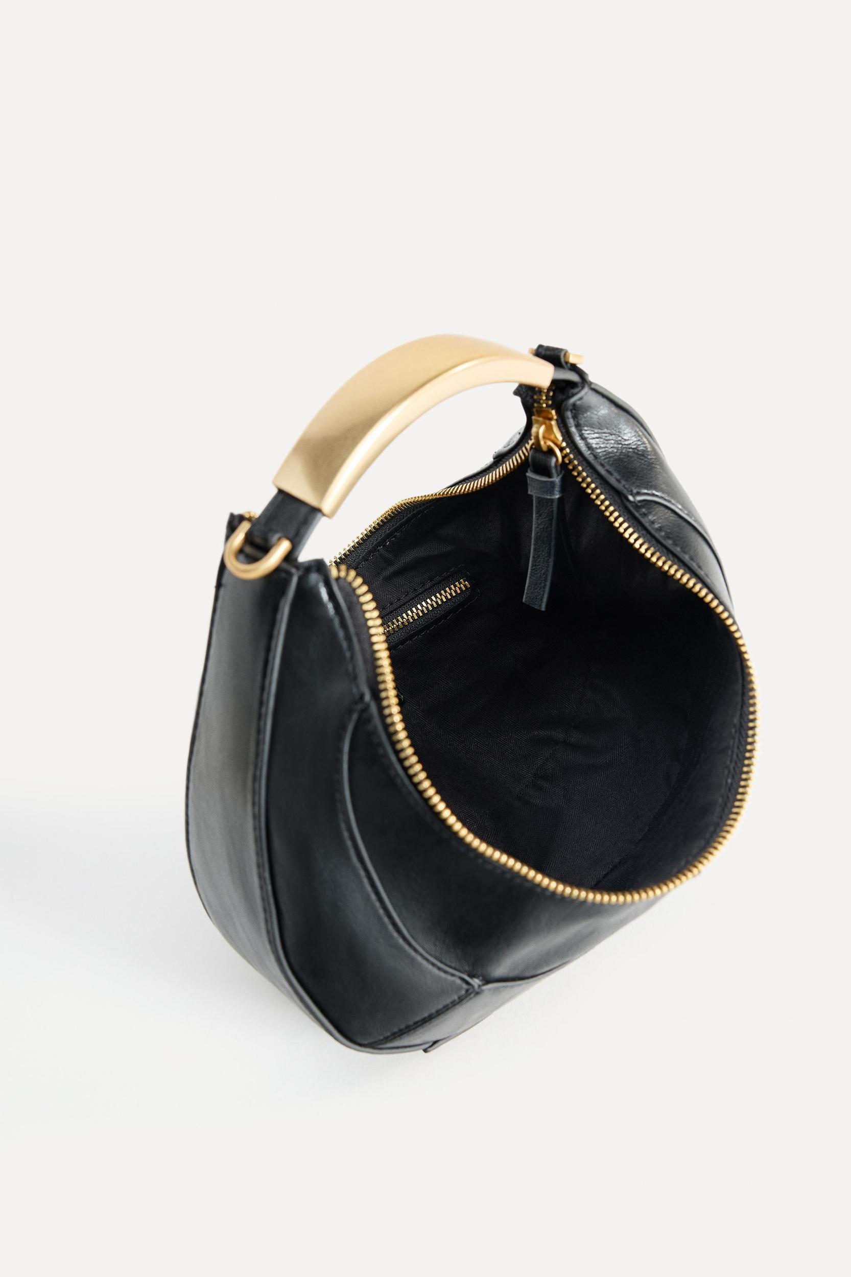 OVAL BAG WITH METAL HANDLE Product Image