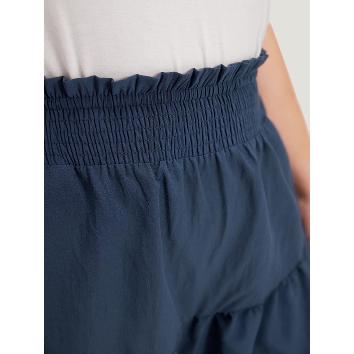 Plus Size Solid Paperbag Waist Shirred Layered Hem Shorts Women Indigo Casual Plain Dailywear Shorts BloomChic 14-16/1X Product Image