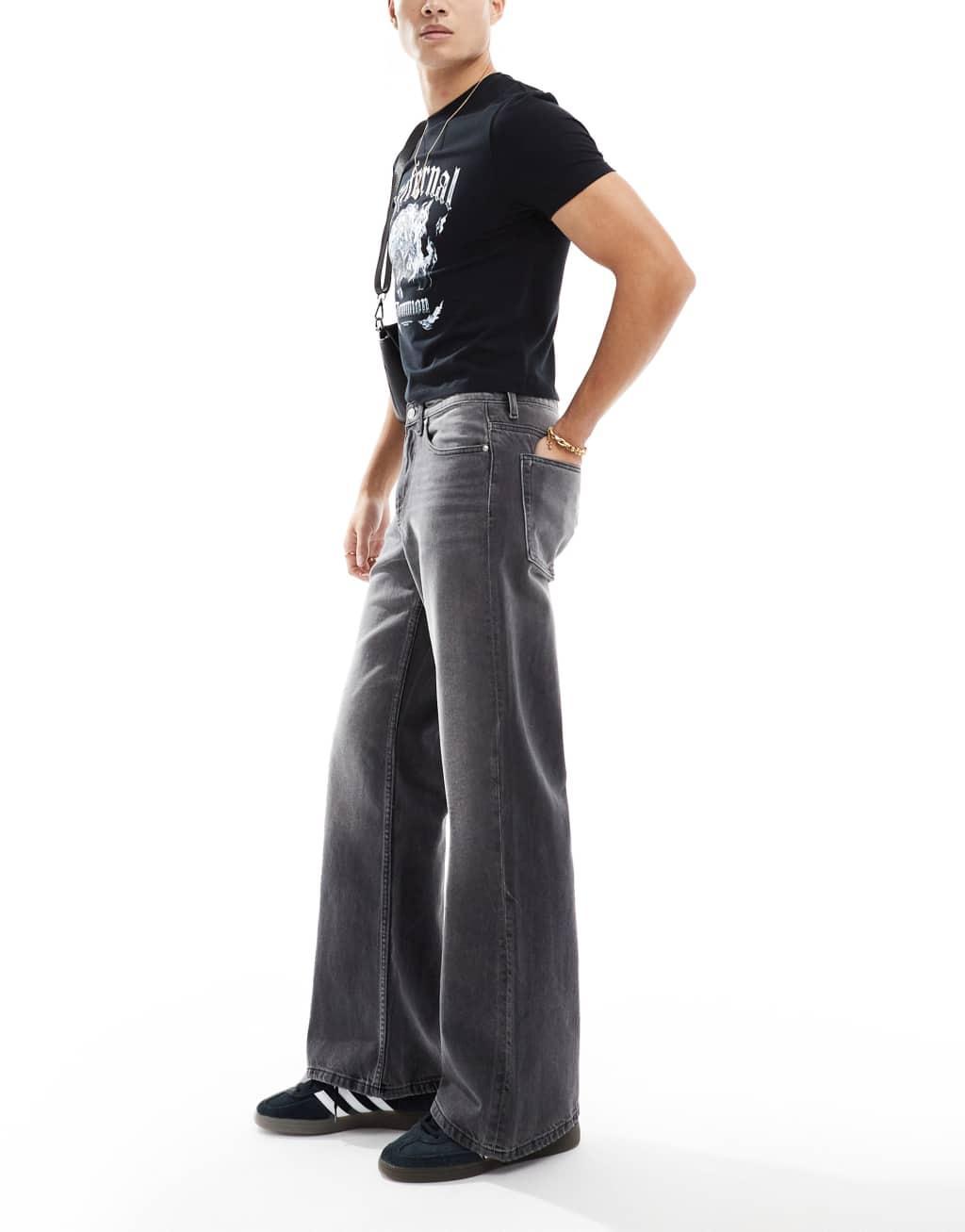 ASOS DESIGN wide flare jeans in washed black Product Image