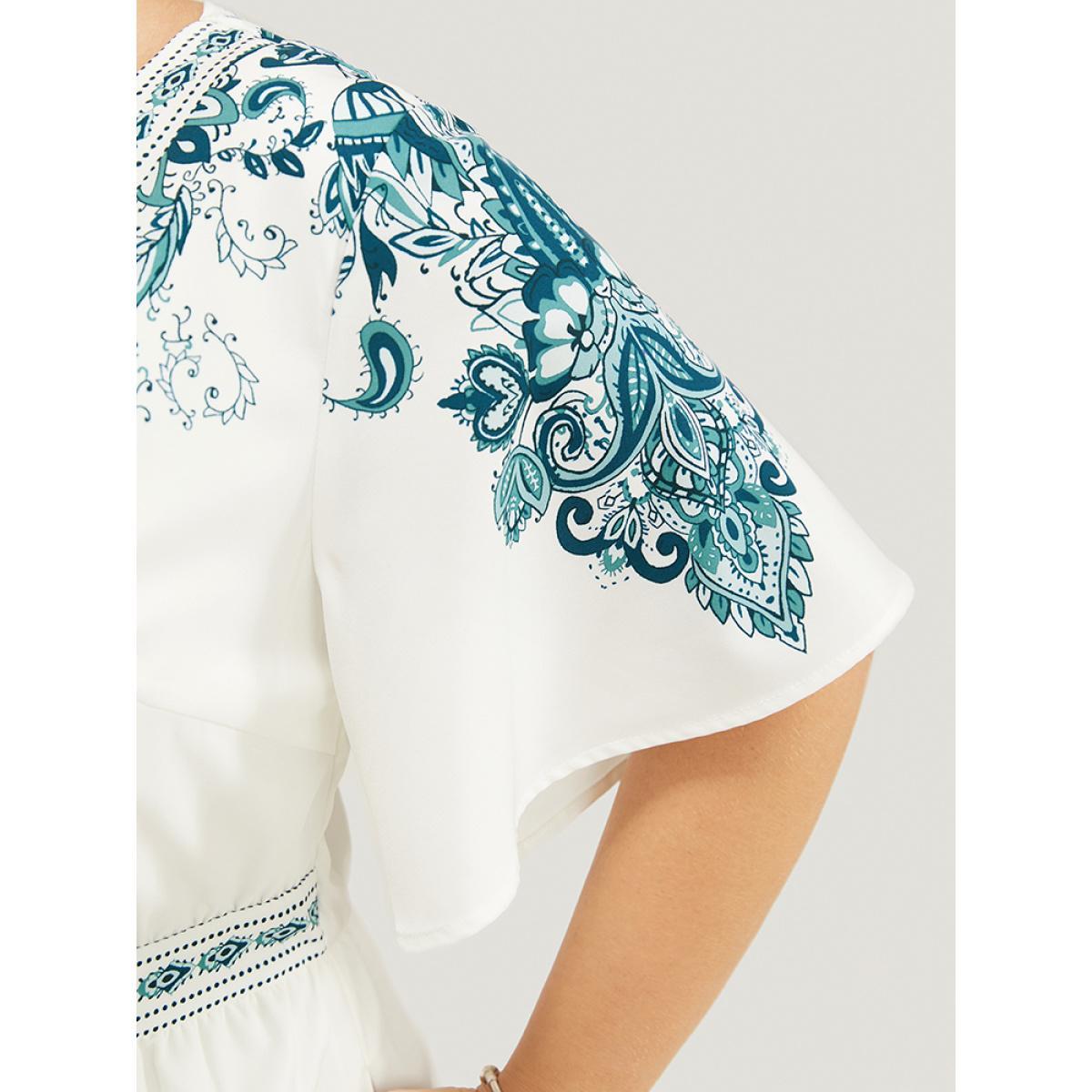 Plus Size Emerald Bandana Print Ruffle Sleeve Pocket Button Detail Romper Women Vacation Short sleeve V-neck Dailywear Loose Jumpsuits BloomChic 30/6X Product Image