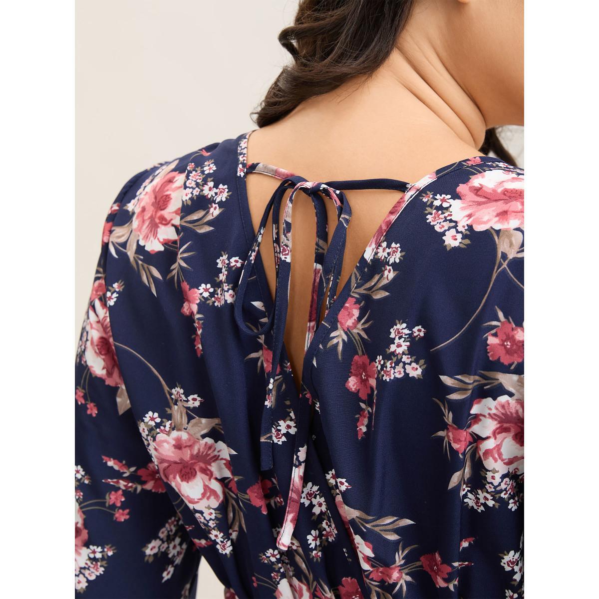 Plus Size DarkBlue Large Flower Pattern Pockets Belted Jumpsuit Women Elbow-length sleeve Overlap Collar Everyday-Elegant Loose Jumpsuits BloomChic 22-24/3X Product Image