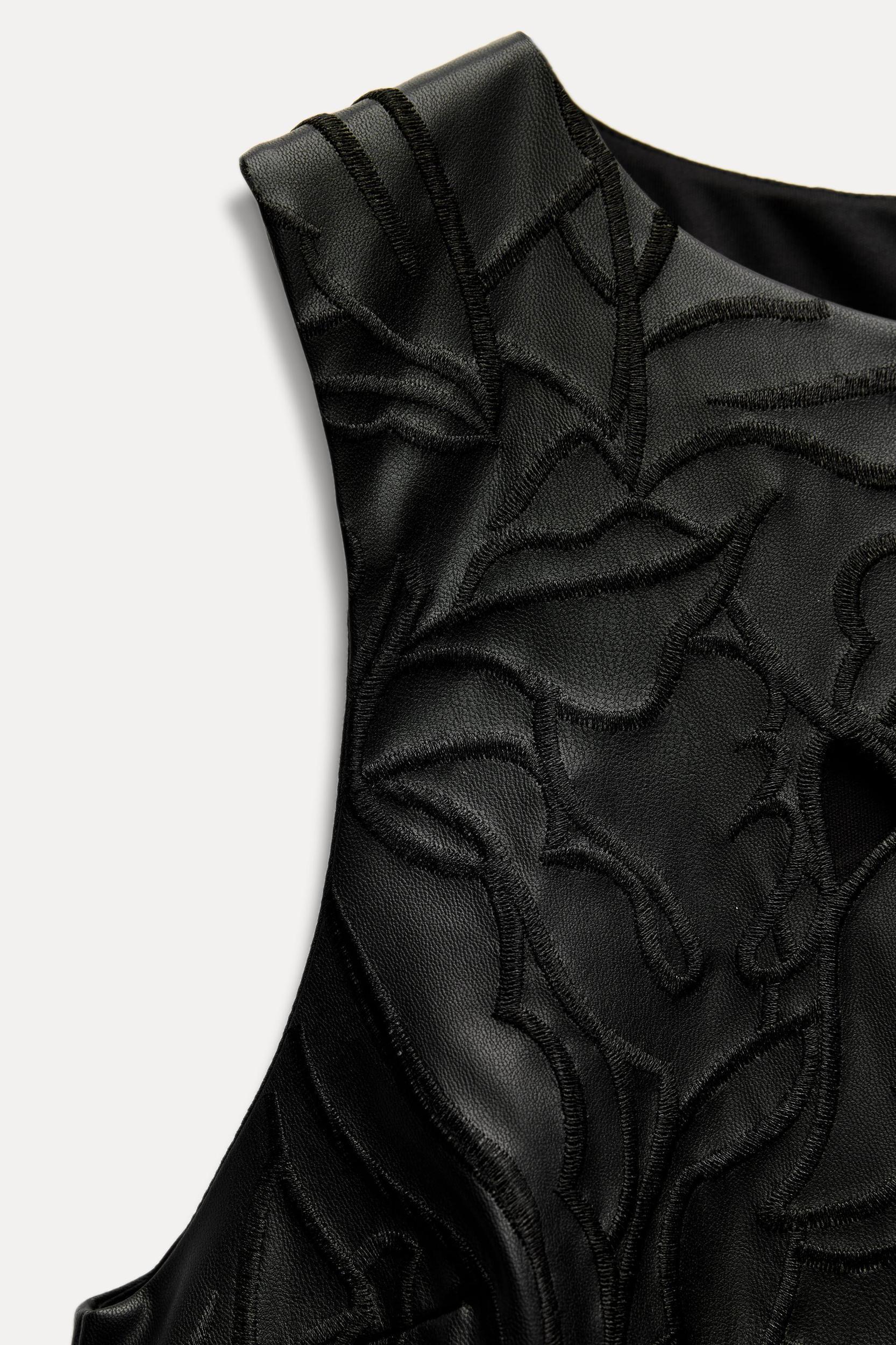 FAUX LEATHER DIE-CUT DRESS Product Image