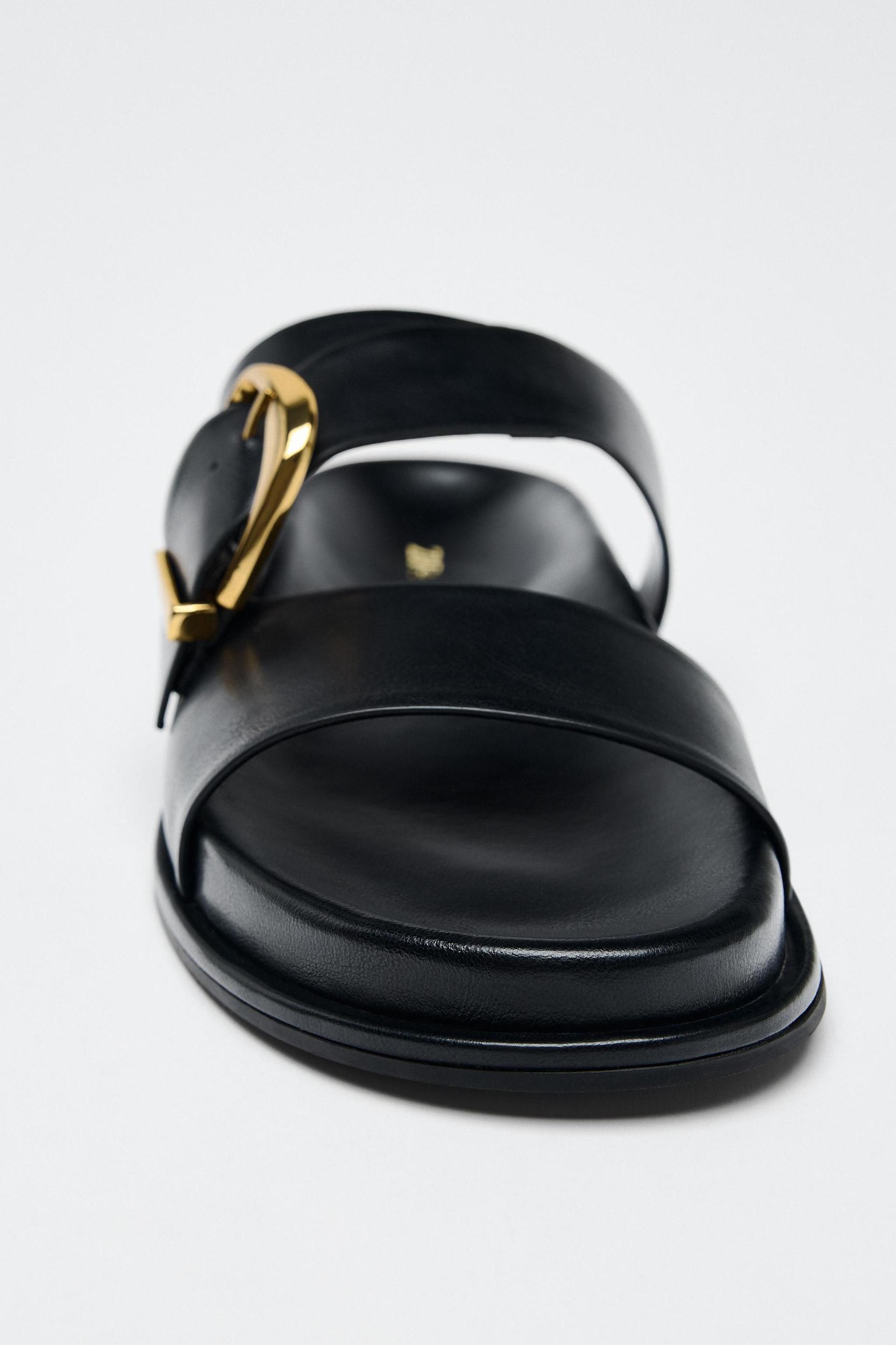 BUCKLE FLAT SANDALS Product Image