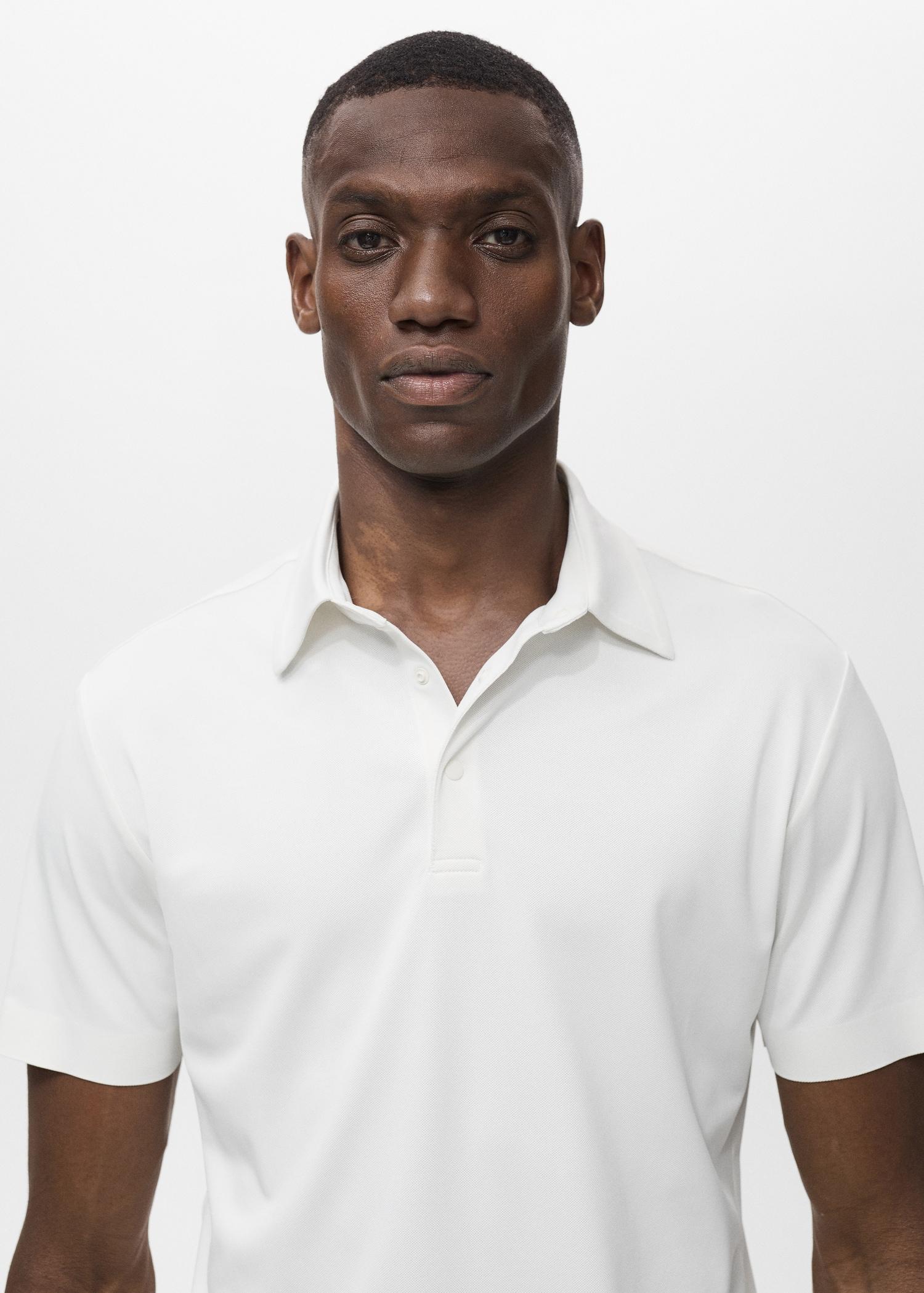 COOLMAX® slim-fit polo shirt - Men | MANGO USA Product Image
