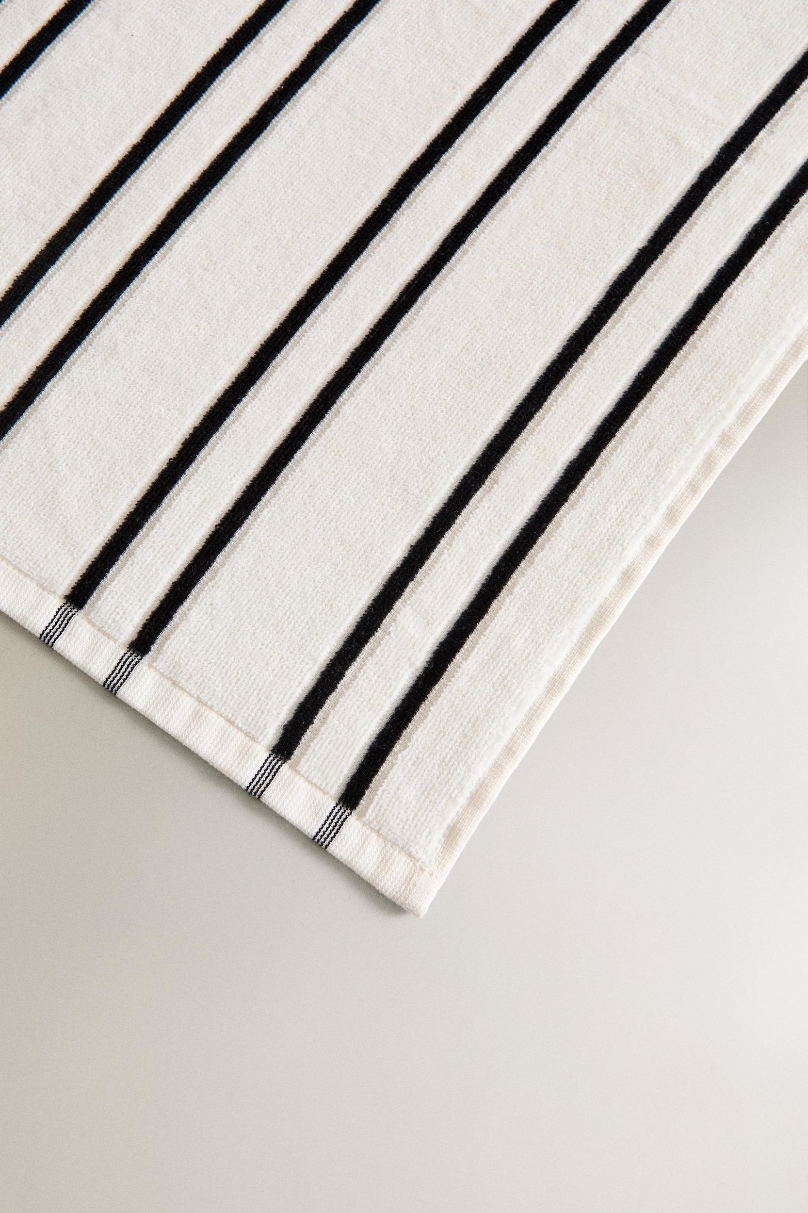 VELOUR BEACH TOWEL WITH THIN STRIPES Product Image