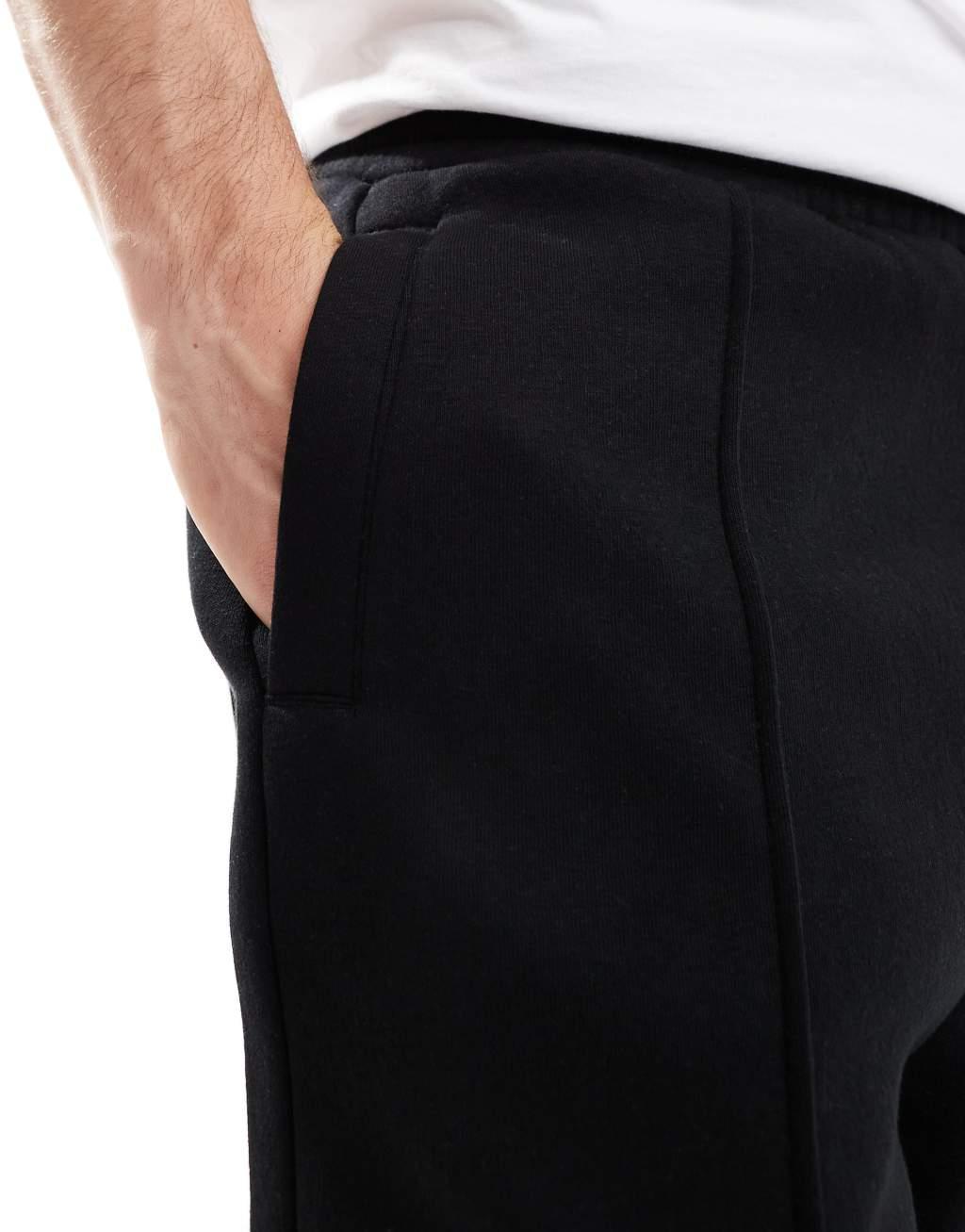Bershka wide leg pintuck sweatpants in black  Product Image