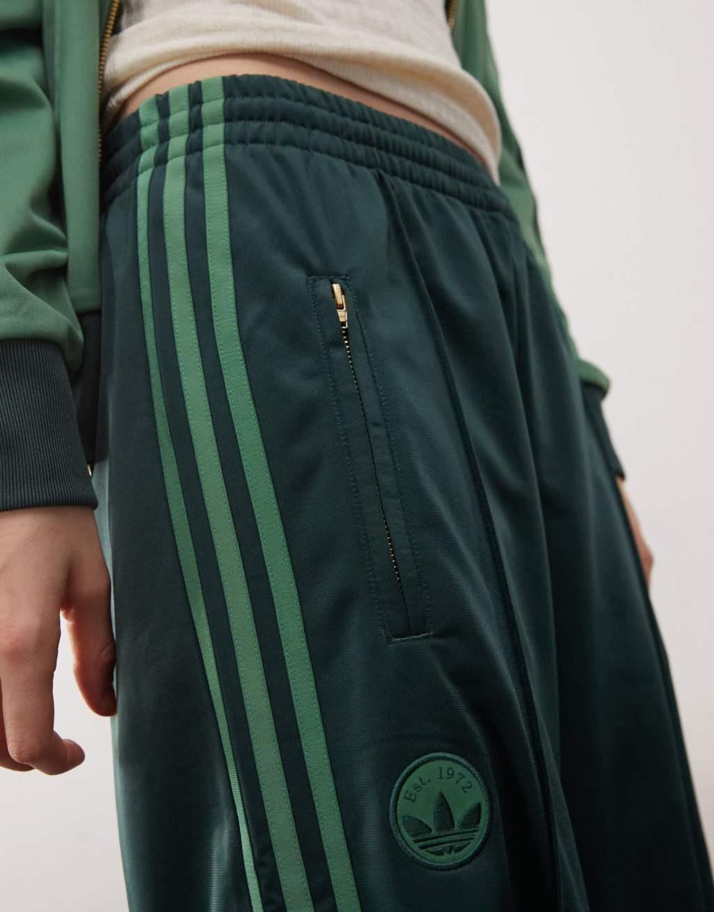 adidas Originals firebird track pants in green Product Image