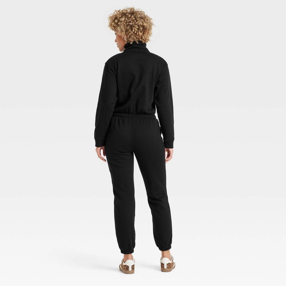 Women's Leisure Studio Long Sleeve Fleece Jumpsuit - Universal Thread™ Product Image