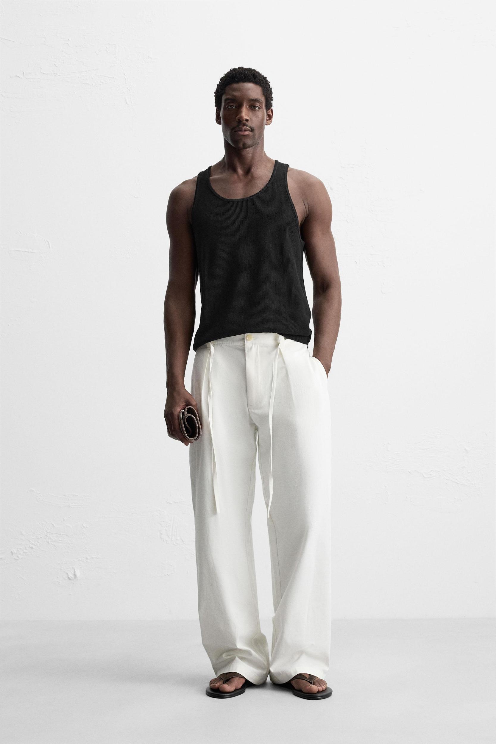RELAXED FIT PLEATED PANTS Product Image