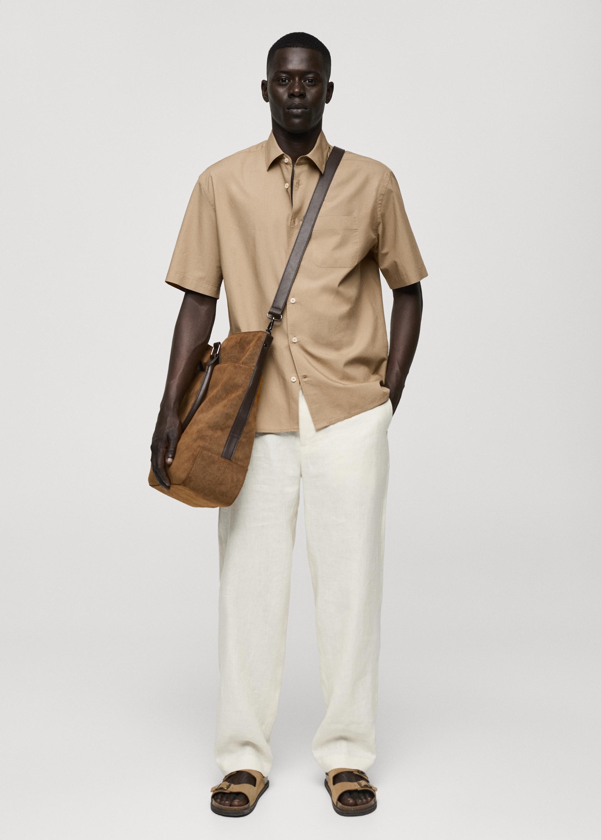 Tencel™™ cotton shirt with pocket - Men | MANGO USA Product Image