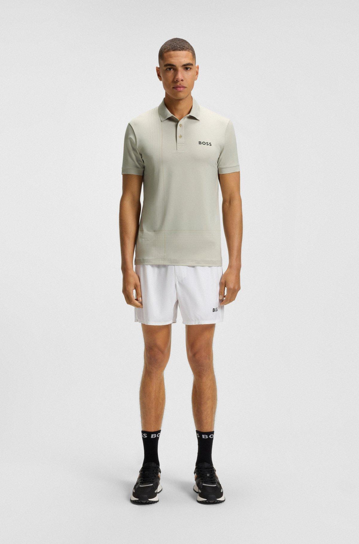 BOSS - Active quick-dry polo shirt with check artwork - Light Beige Product Image
